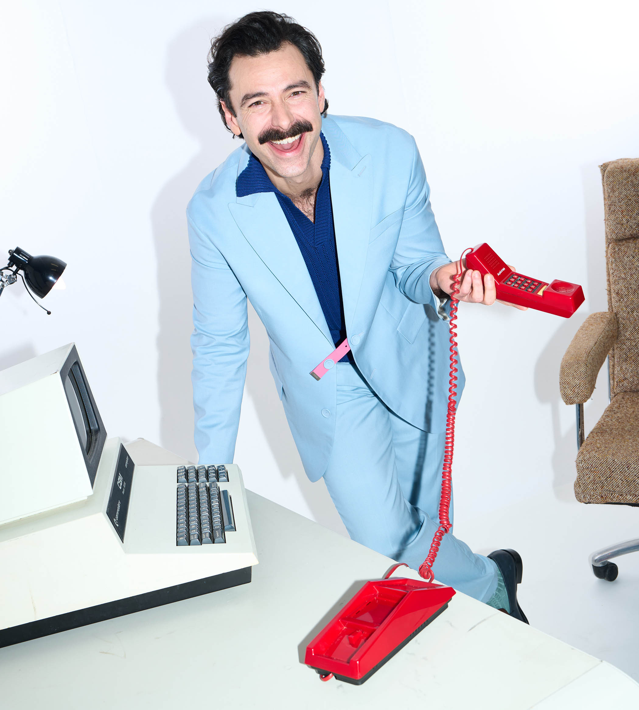 Aidan Turner wears jacket, trousers and polo shirt by Fendi, and shoes by Christian Louboutin. Grooming by Petra Selge from the Wall Group