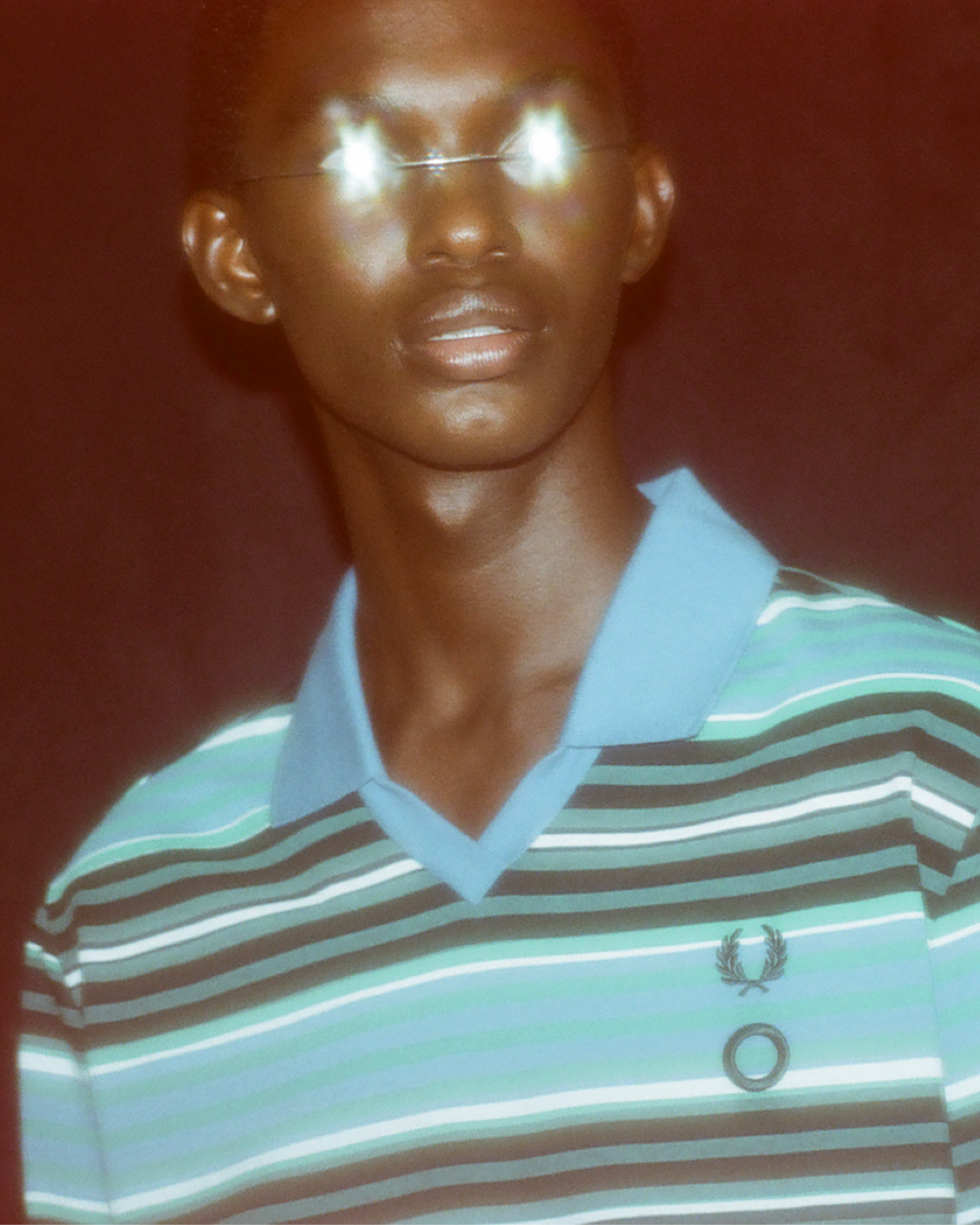 New FredsFred Perry reunites with Craig Green for a new collection that takes cues from sporting archetypes and subcultural reference points. Green subverted the classic Fred Perry shirt with an elongated draw cord worked into the polo collar. Clashing motifs in a polo, T-shirt and quilted overshirt have been crafted with contrasting blocks of colour and pattern, slicing garments horizontally or vertically. Hero pieces have Craig Green signature touches, a hooded alpine jacket and a raglan sleeve shirt jacket have the designer’s workwear influences with contrast stitching alluding to the Fred Perry twin tipping at collars and cuffs. £125, Fred Perry