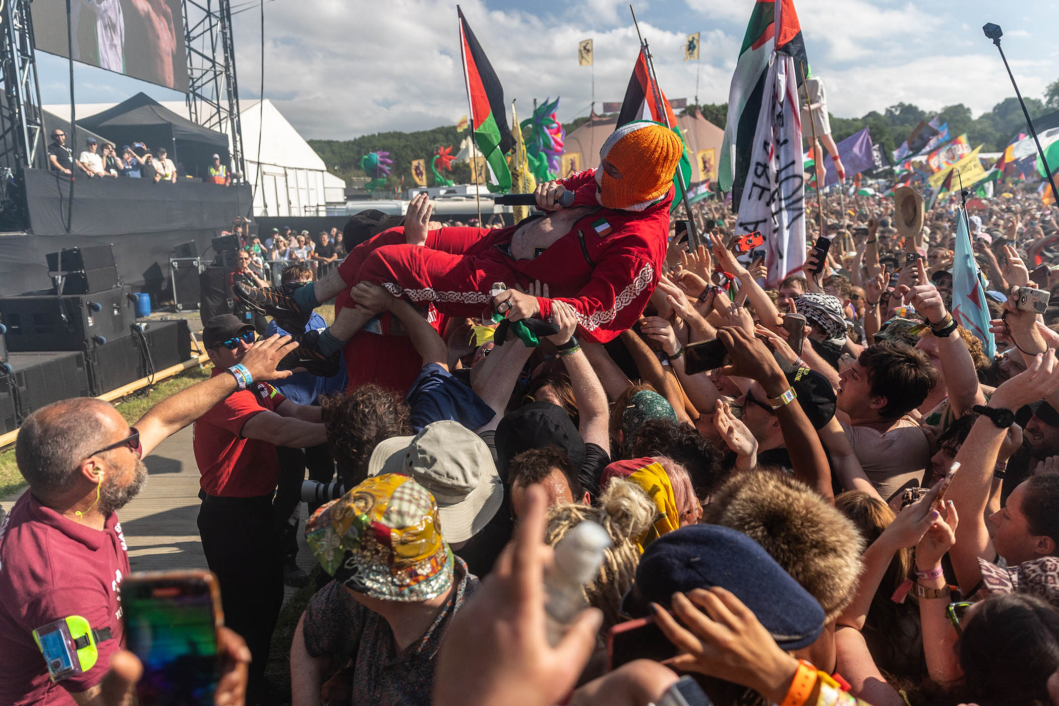 A crowdsurfing DJ Próvaí at Glastonbury