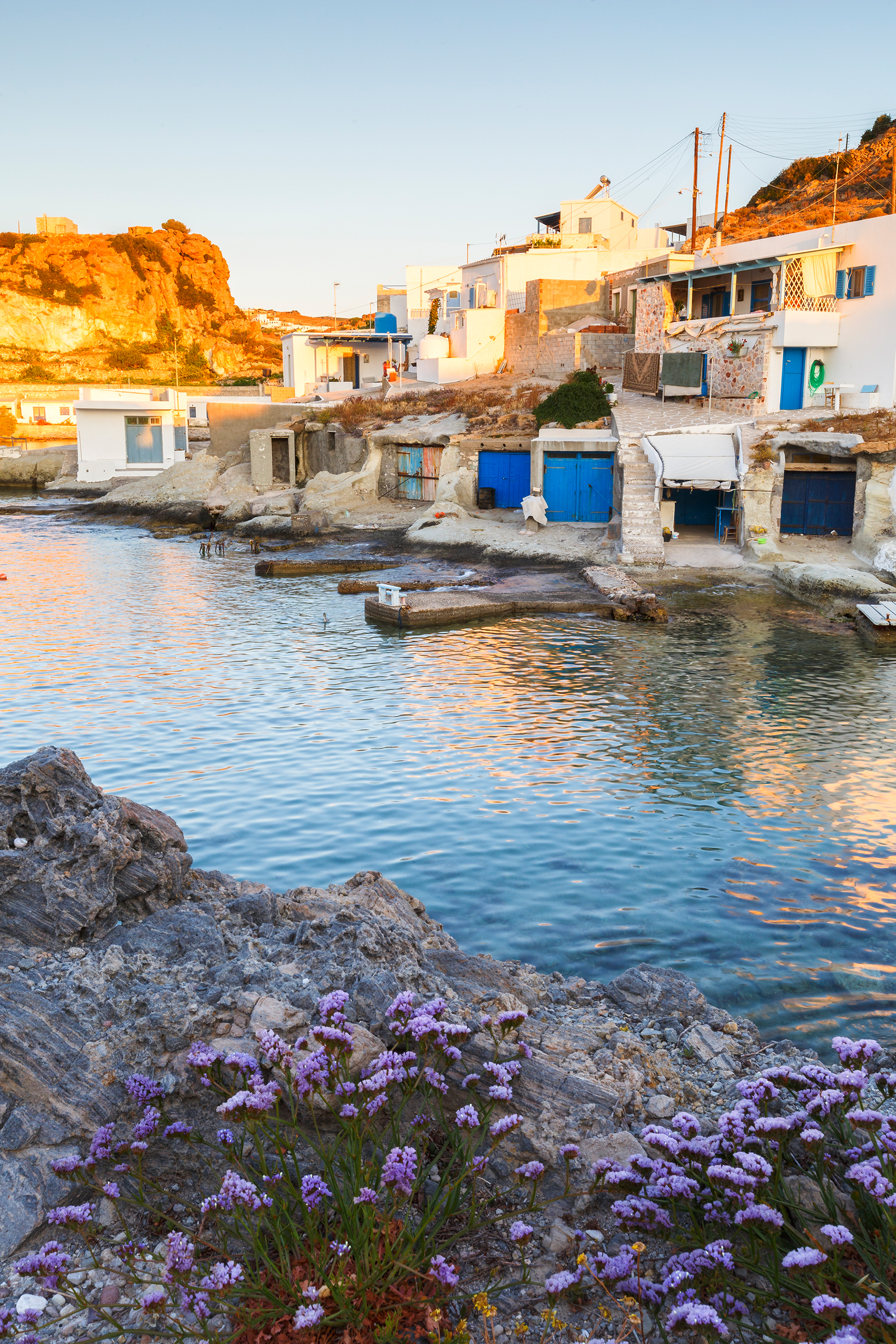 Water board: boat houses in the fishing village of Goupa