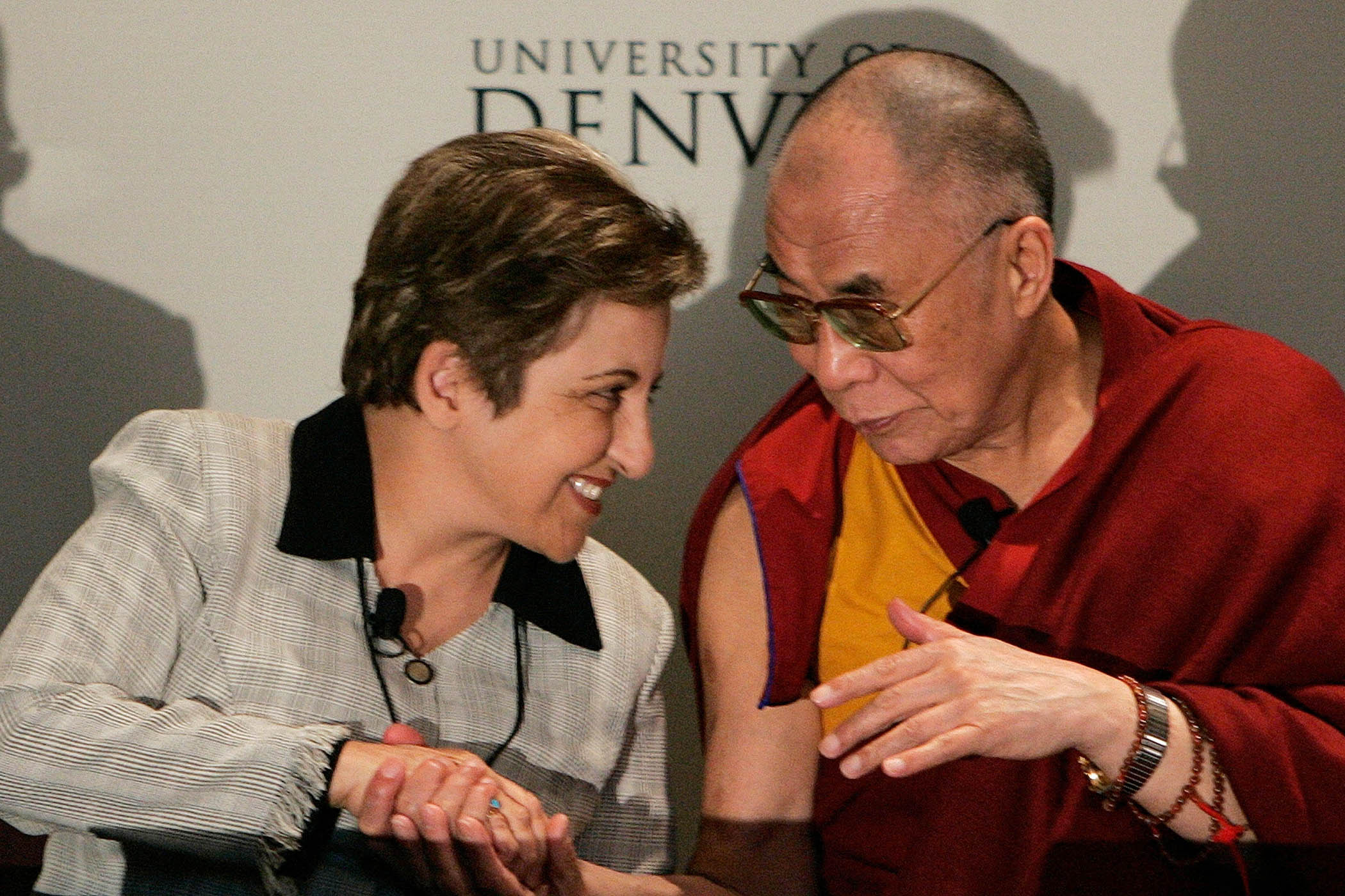 With the Dalai Lama at the 10th anniversary of PeaceJam in 2006. Photo by UPI Photo/Gary C. Caskey
