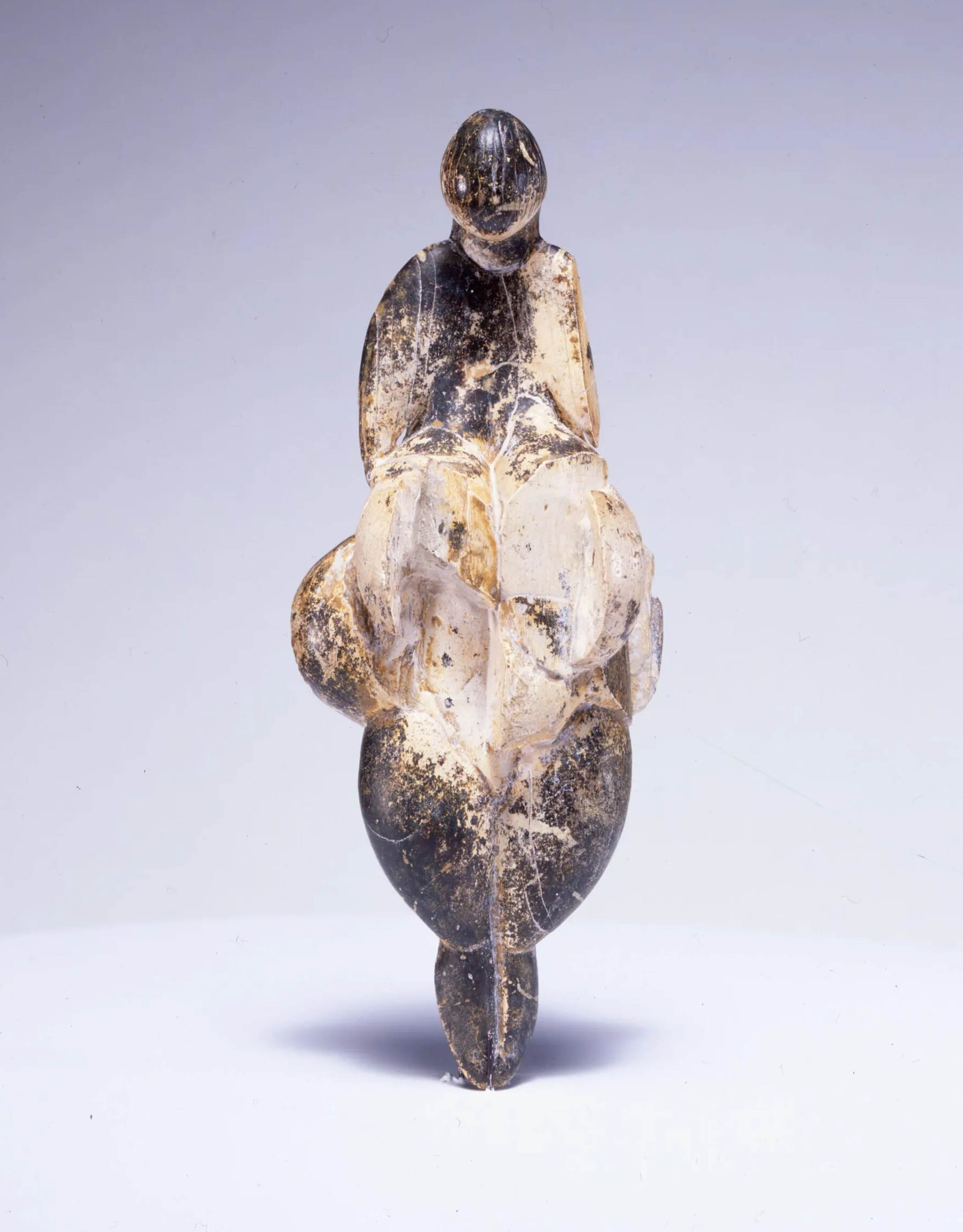 Main picture: Jeff Koons in Athens with his Balloon Venus Lespugue (Orange) and, above, the original, from circa 23,000BC