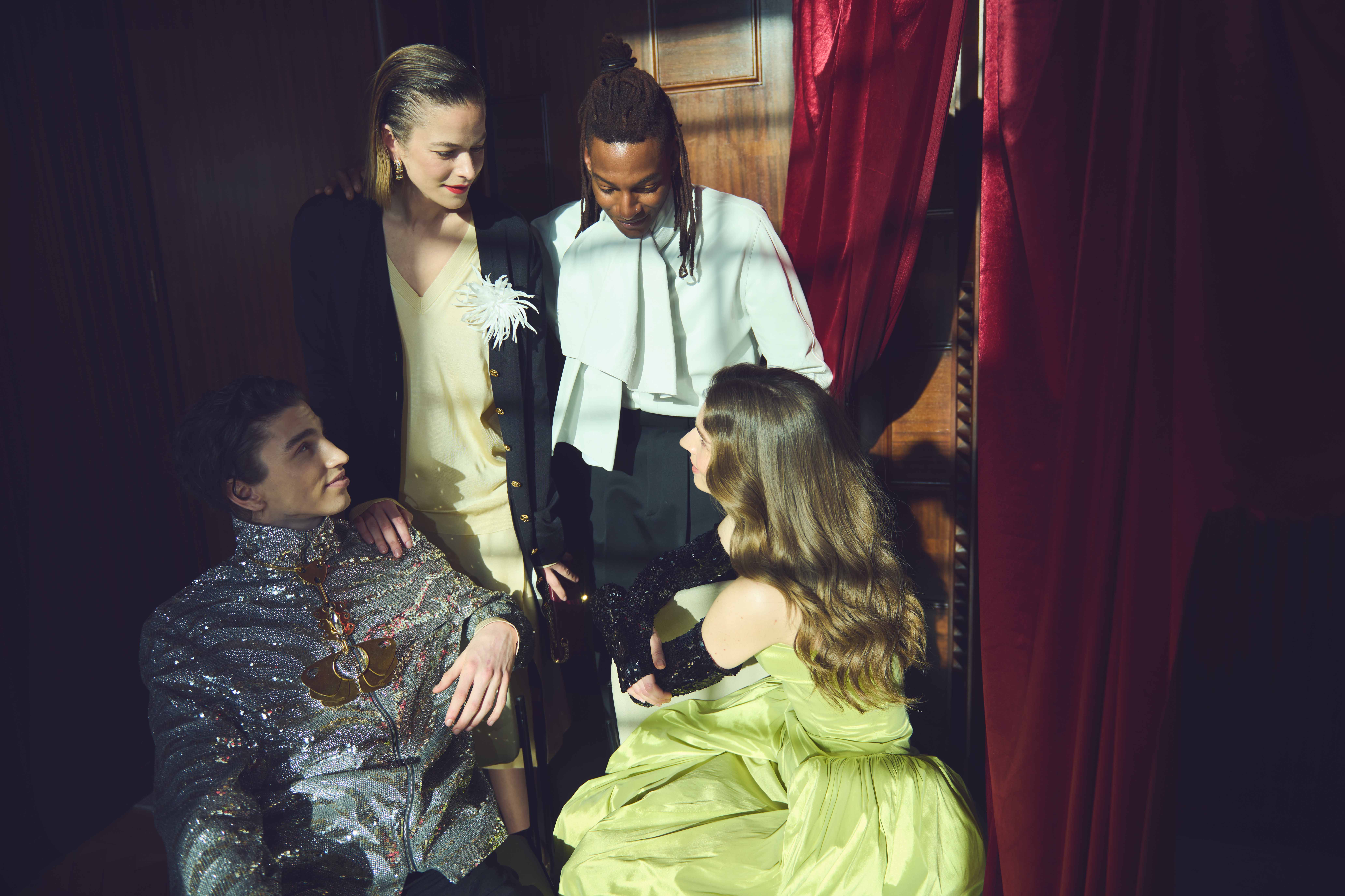 Clockwise from top left:Â Alex wears earrings, cardigan with corsage, V-neck, skirt and bag all by Chanel; Ty wears leather-bow shirt and trousers by Givenchy by Sarah Burton; Louis wears sequin bomber, necklace and trousers all by Valentino; Maddy wears strapless dress and sequin gloves by Simone Rocha