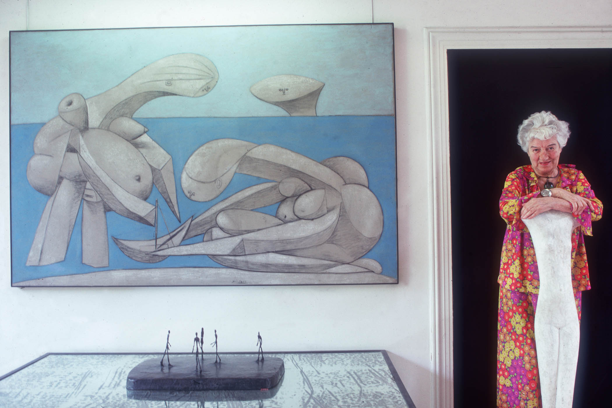Guggenheim at her Palazzo Venier dei Leoni, with Picasso’s On the Beach, in 1978