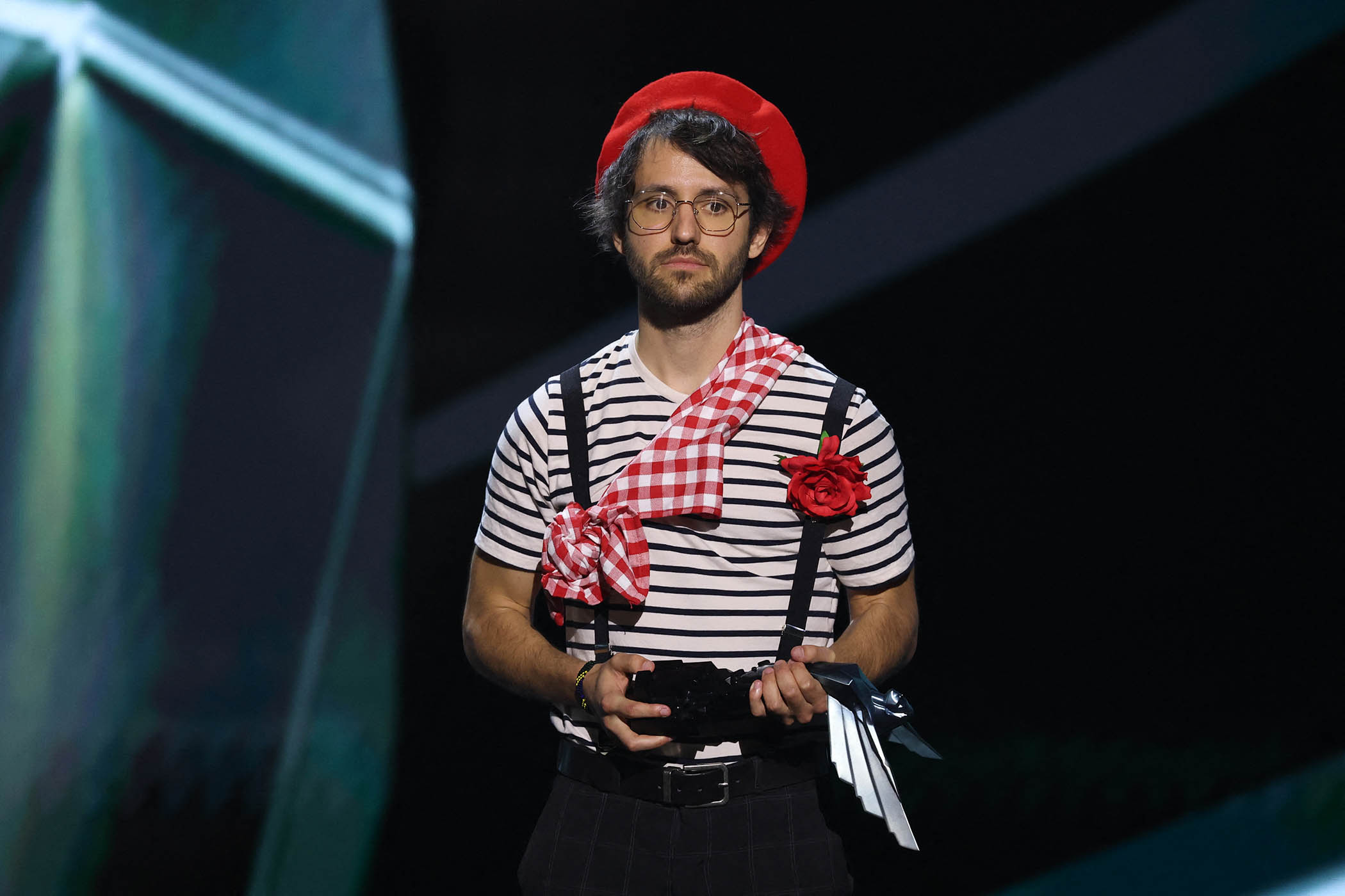 Guillaume Broche, the creator of Clair Obscur, in the outfit that some of its characters wear in the game