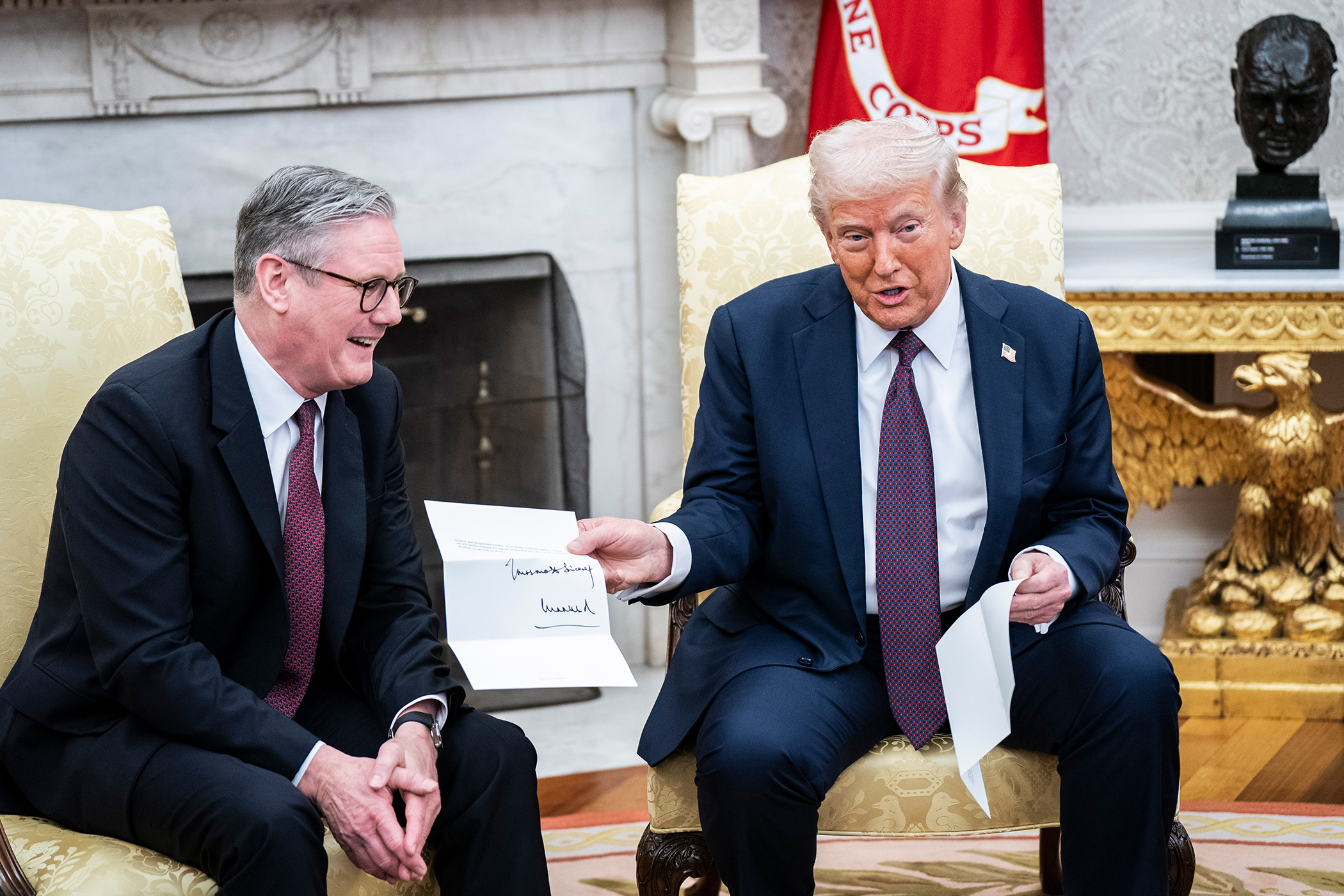 Keir Starmer presents Donald Trump with a letter from King Charles in February last year, inviting the US president back to the UK for a second state visit.