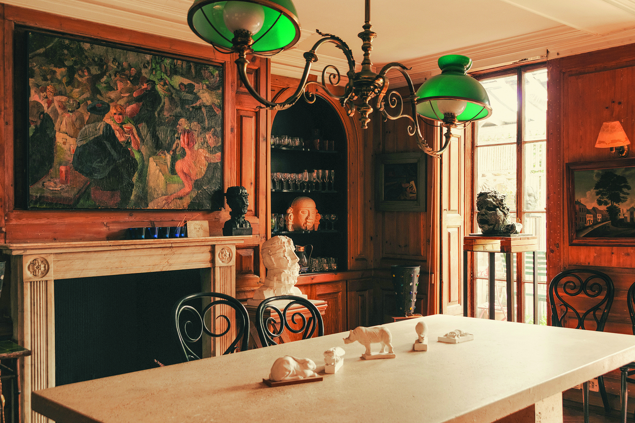 Tablew talk: in the dining room the centrepieces are sculptures by Farhi’s friend and mentor, Sir Eduardo Paolozzi