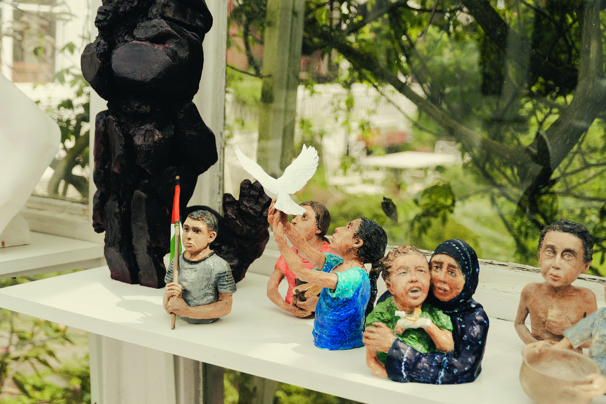 Pieces for peace: Farhi’s hand-painted busts of children in Gaza