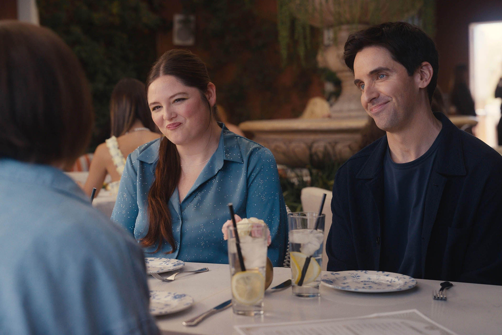 In Hacks, her breakout role, as delusional assistant Kayla, with writer and co-star Paul W. Downs