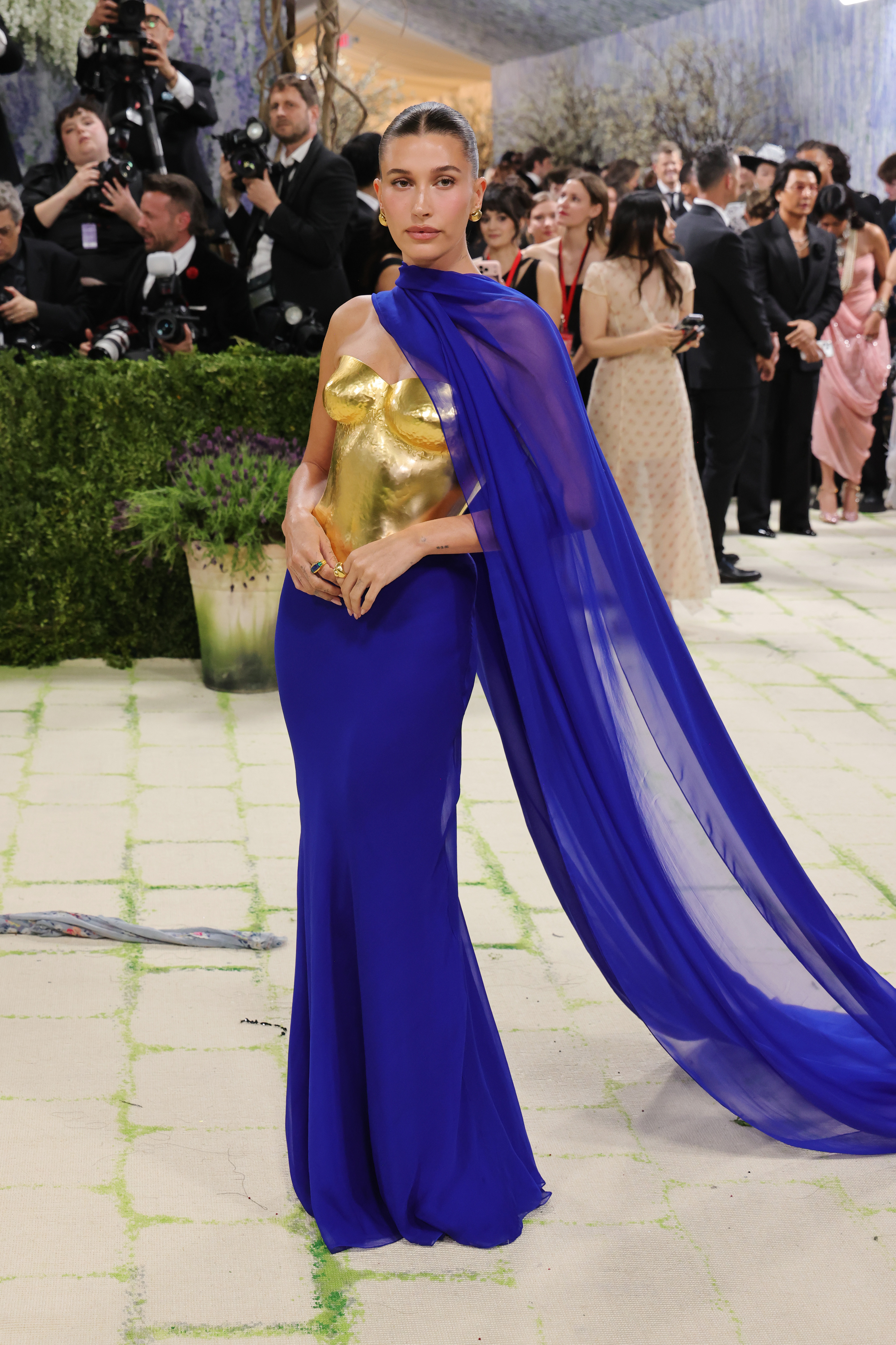 Hailey Bieber chose a blue-and-gold Saint Laurent by Anthony Vaccarello look, with a 24-karat bustier moulded from her own body. It was inspired by Saint Laurent’s AW 1969 couture collection, where Yves Saint Laurent collaborated with French artist and sculptor Claude Lalanne to mould two sculpted bodices.