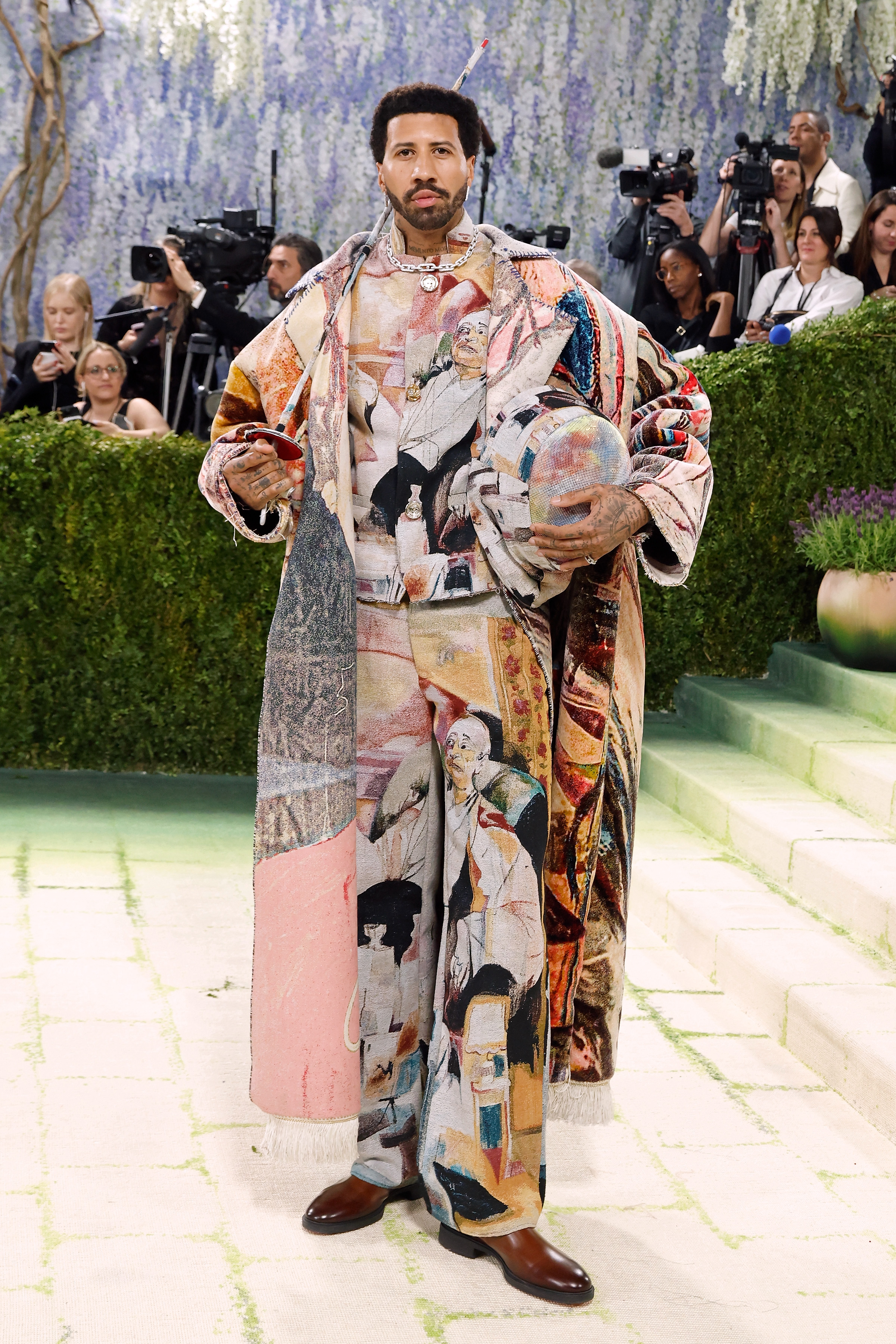 Olympic fencer Miles Chamley-Watson turned himself into a walking cubist masterpiece by Colm Dillane aka KidSuper. Dilane has form when it comes to fashion as art – his SS23 show was a pastiche of a live art auction.