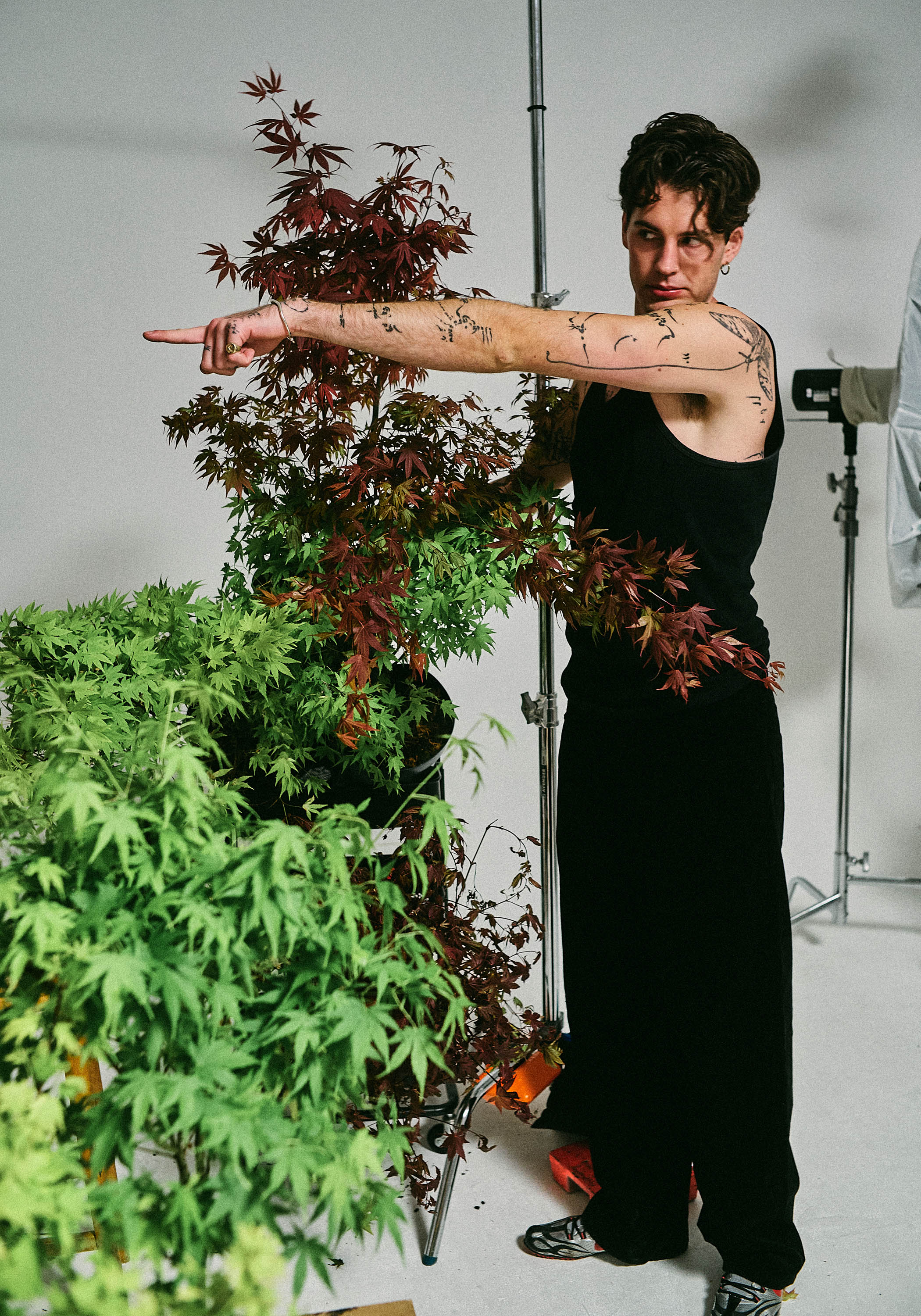 Powell building the floral set for The Observer photoshoot