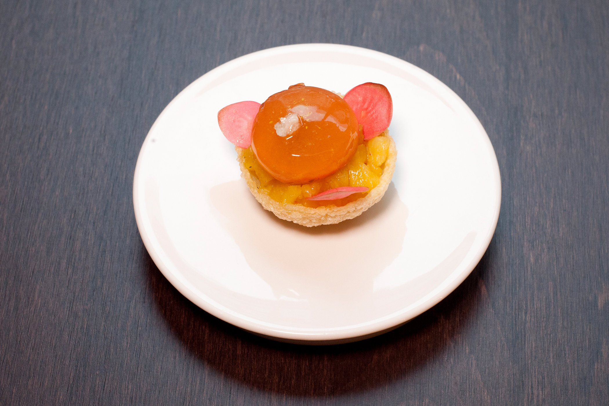 A popping-candy pani puri full of pickled pineapple