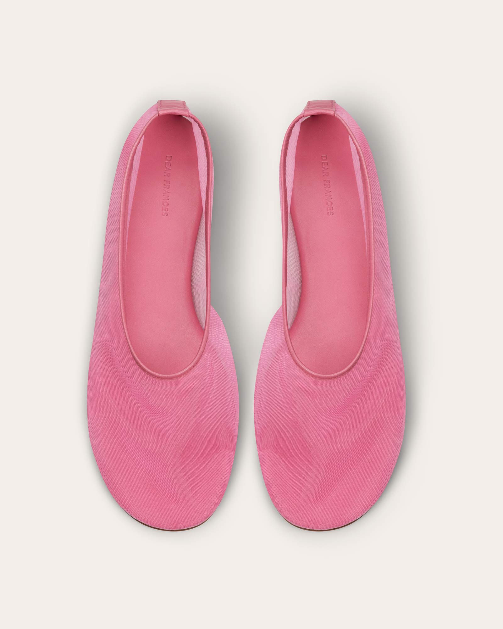 Raising the barre Cool mesh ballet flats are this summer's must-have. These, in limited-edition sugary pink sherbet (launching 4 June), add a fizz of serotonin to a crisp summer white look, and are the perfect lightweight accessory to pop in your bag to give your feet a rest from heels after a night out. £295 Dear Frances