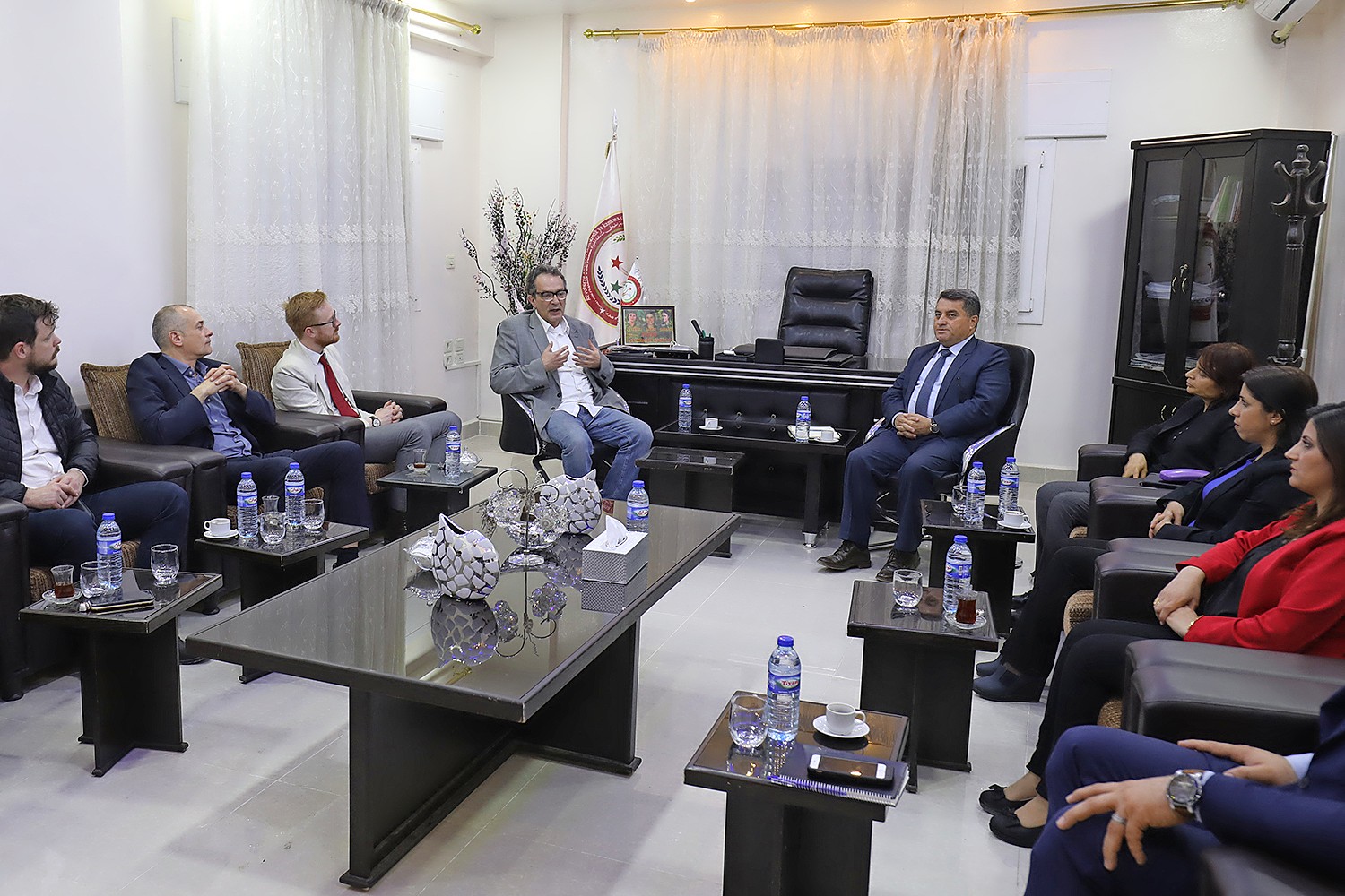 Glasman (centre) among a group of Labour politicians meeting a Kurdish delegation in Westminster, 2018