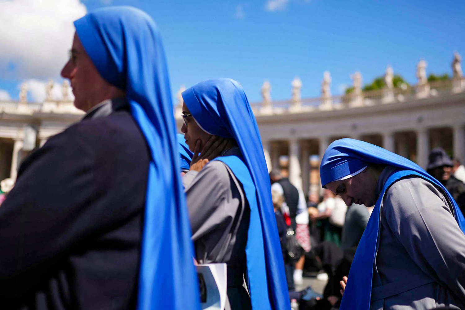 Mourners in St Peter’s Square on Saturday. Photograph: Dimitar Dilkoff/AFP/Getty
