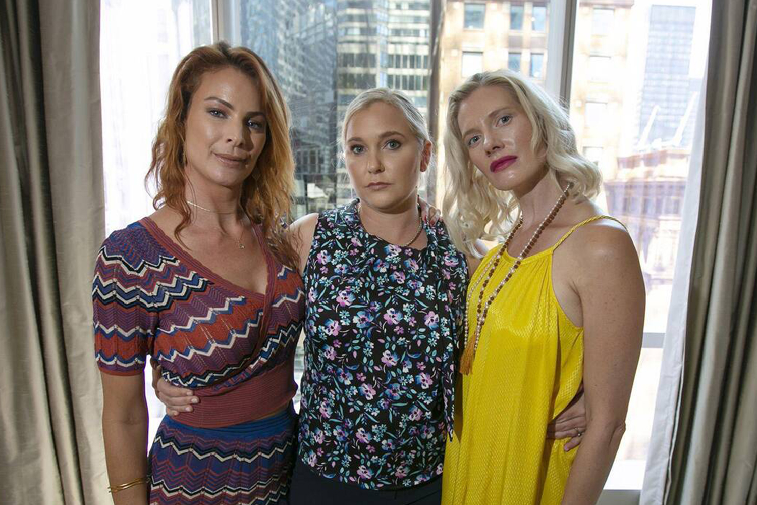From left, Sarah Ransome, Virginia Roberts Giuffre, and Marijke Chartouni after an emotional court hearing for victims of Epstein in 2019.  Photograph: Sipa US/Alamy