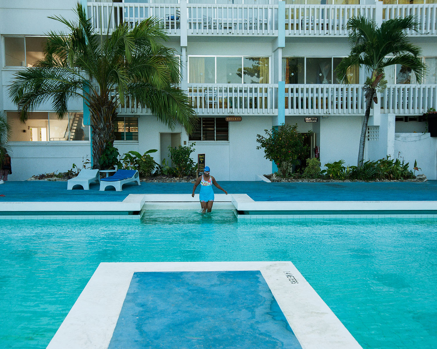 A swimmer at what used to be a five-star Mombasa hotel built in the 1980s.