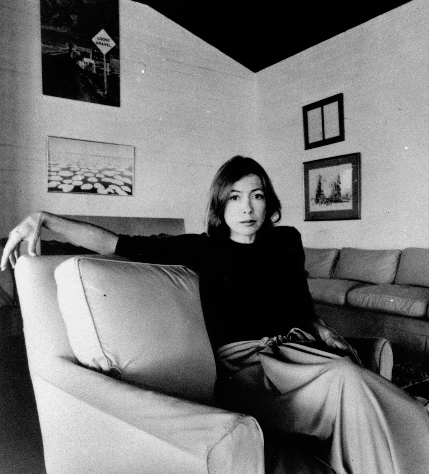Joan Didion photographed in the art department of Vogue magazine in 1958.