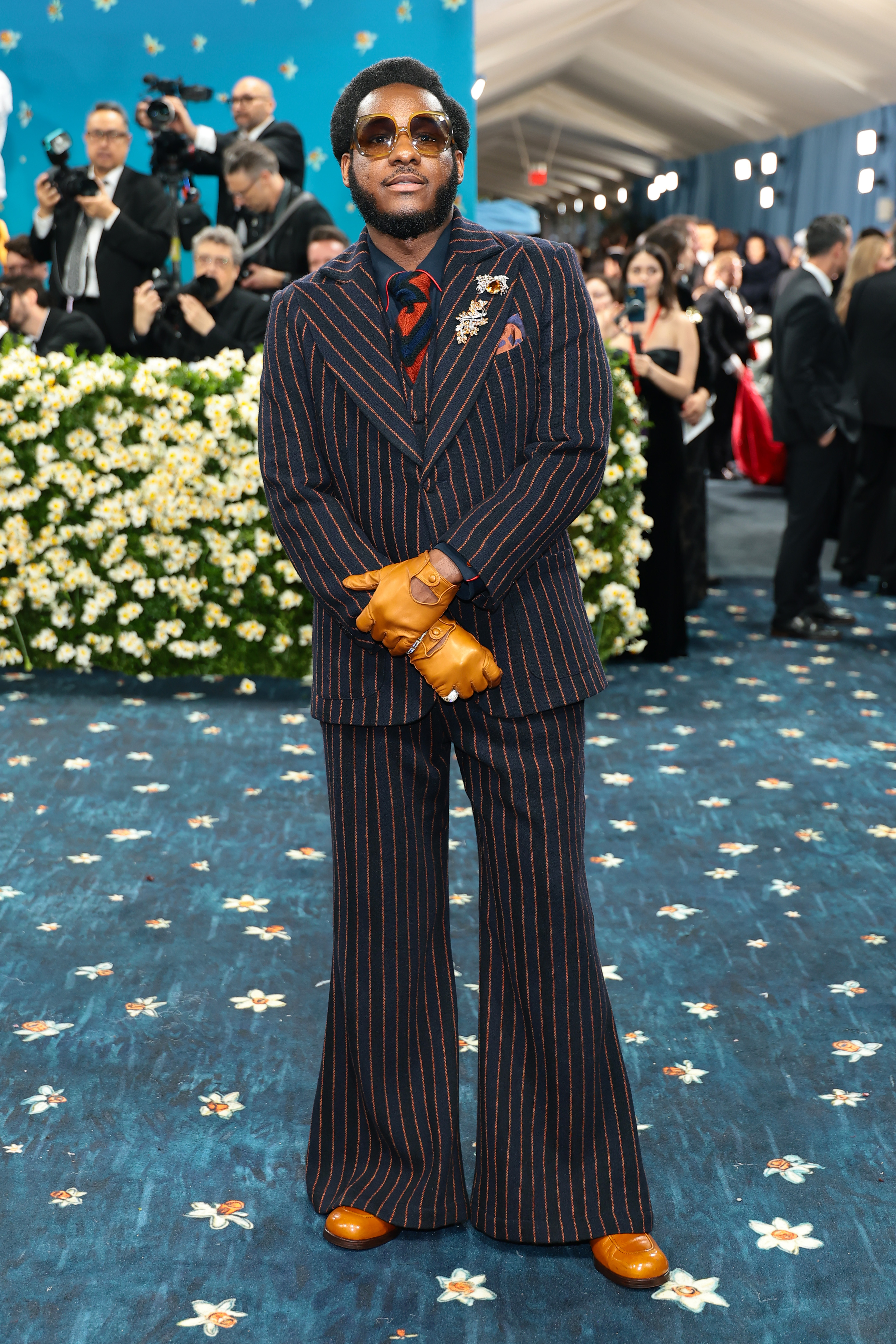 Leon Bridges’s outfit was inspired by 1970s looks of figures including Miles Davis.  Photo by Dimitrios Kambouris/Getty Images for the Met Museum/Vogue