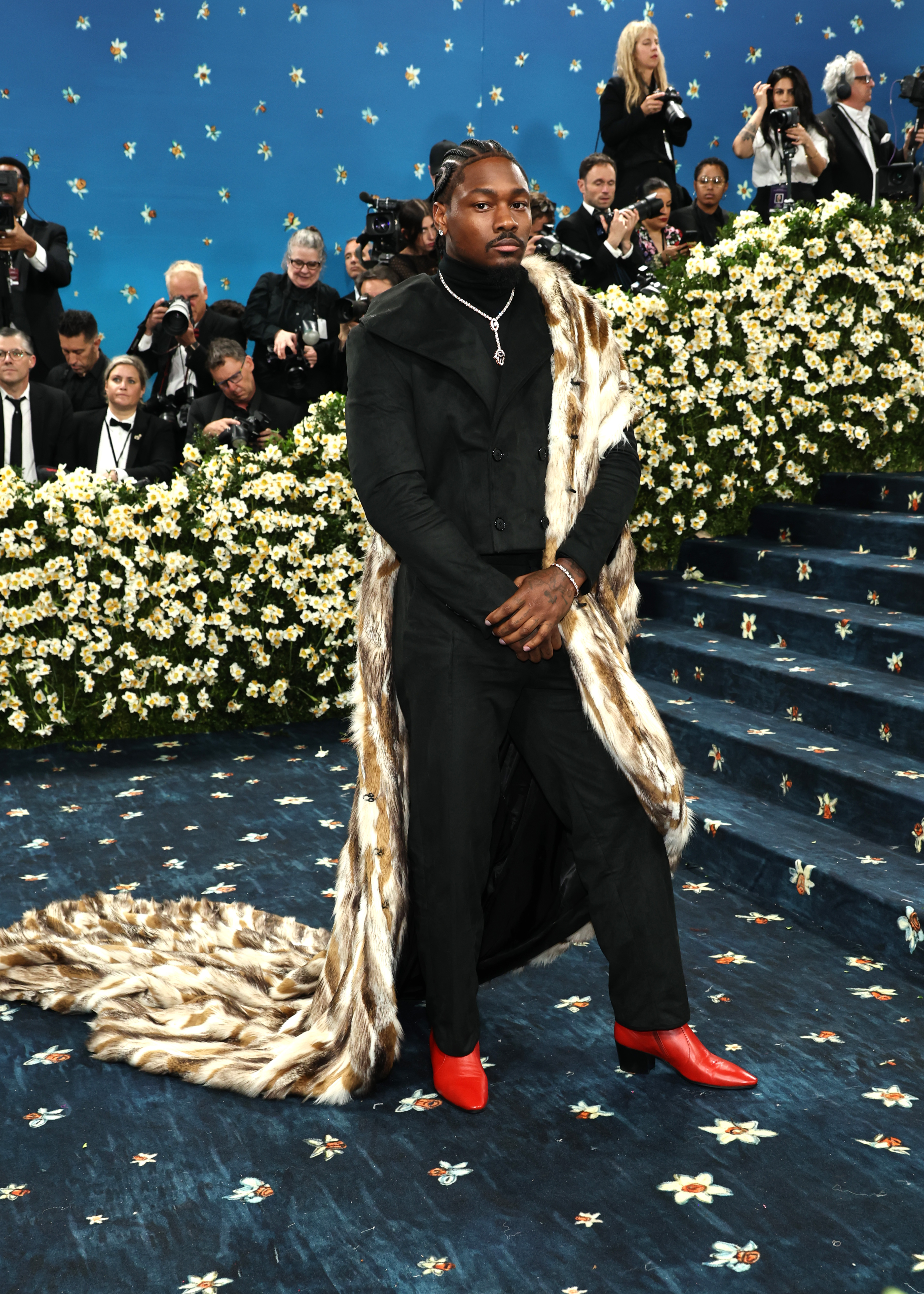 A faux fur cape features in the outfit designed for Stefon Diggs.  Photo by Jamie McCarthy/Getty Images