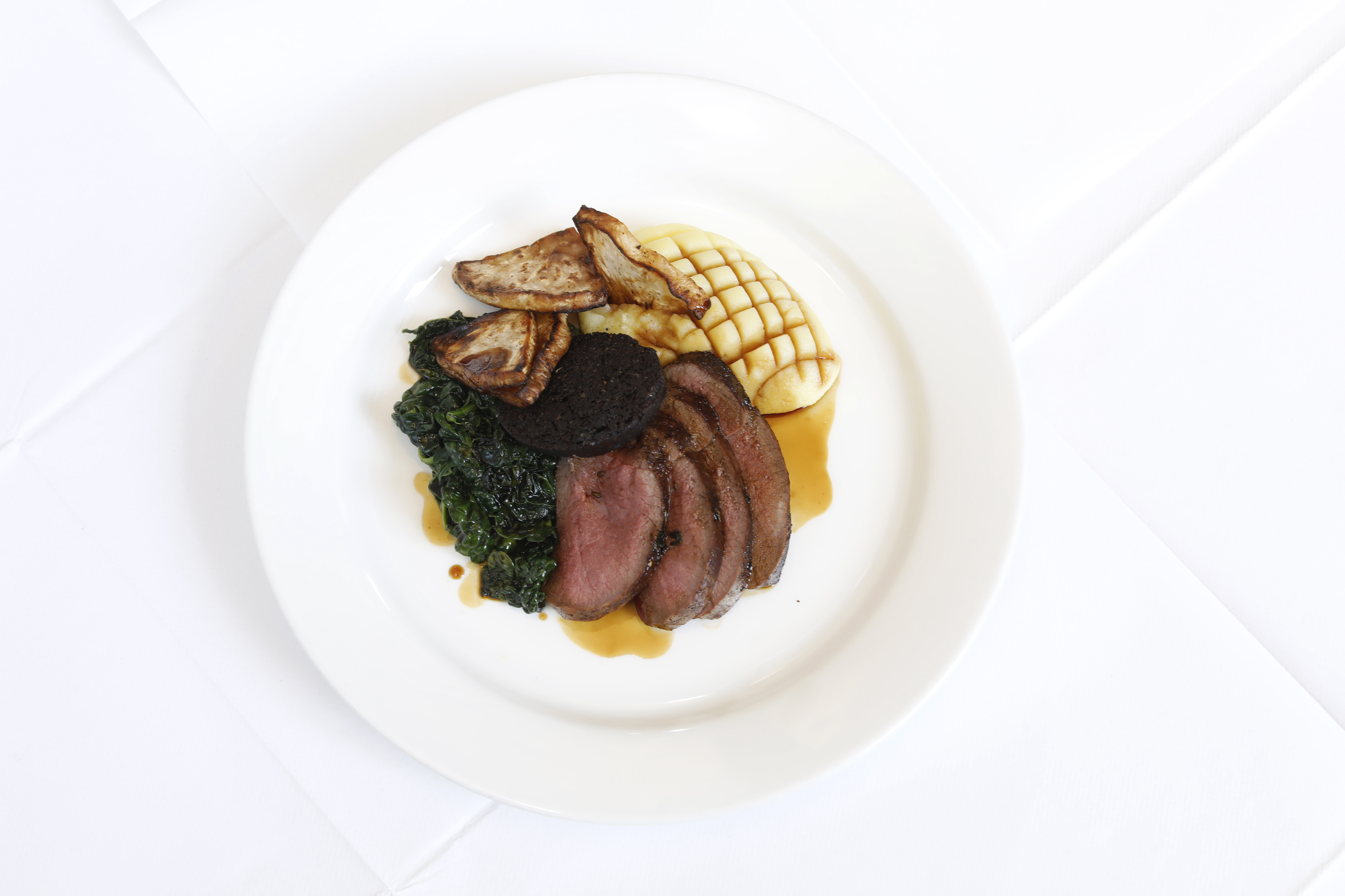 ‘Rosy pink and tender’: Borders roe deer with buttery mash, Stornoway black pudding, and roast celeriac