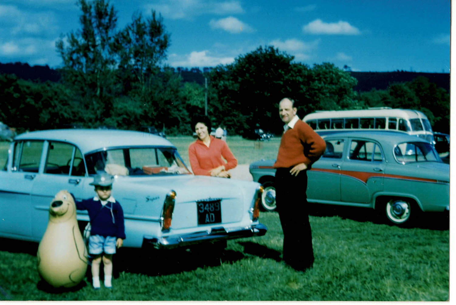 Aged five, Geoff with his mother and father and their Vauxhall Victor, Gloucestershire, circa 1963