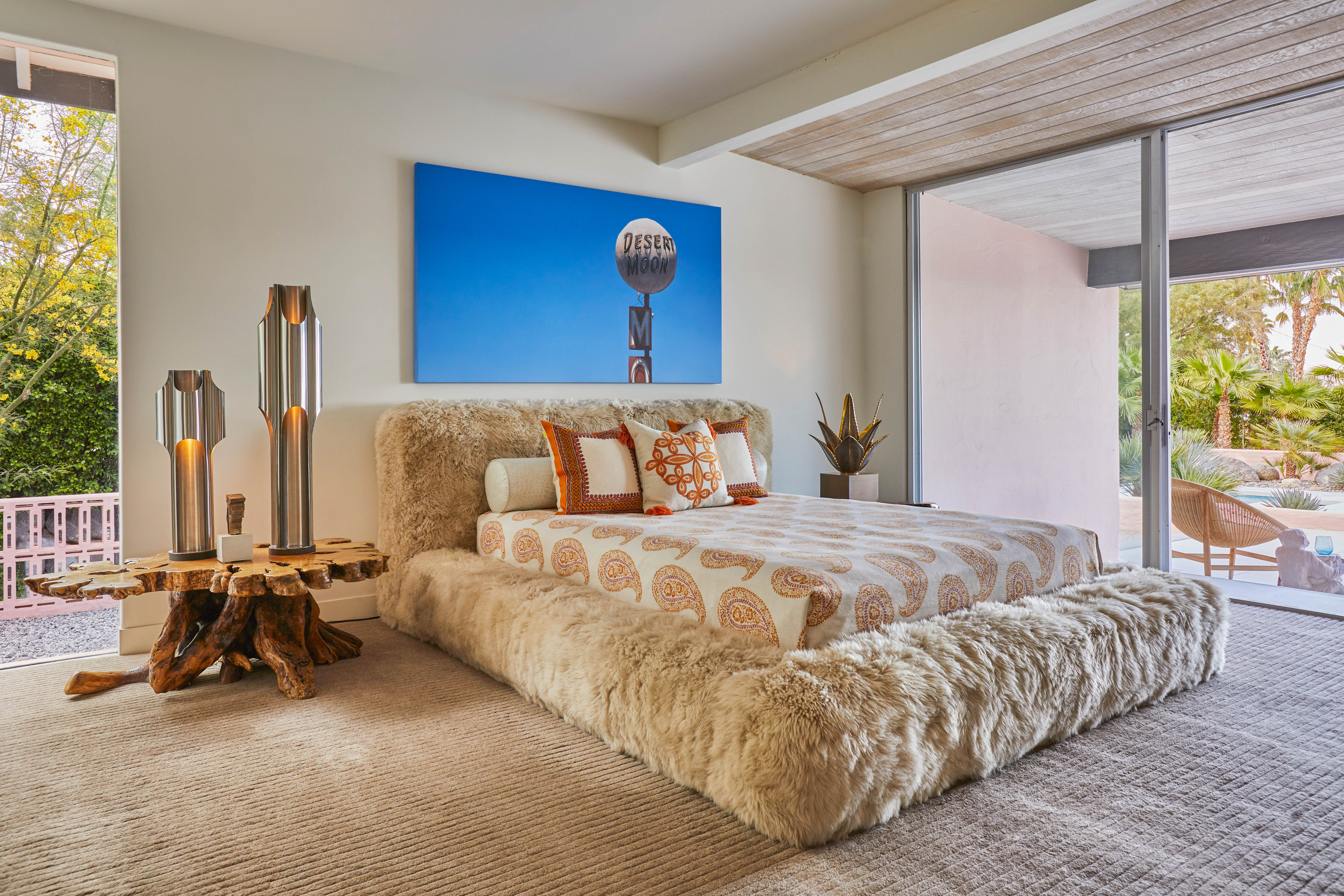Hot stuff: the house marries unexpected combinations like this furry bed alongside sleek futuristic lamps