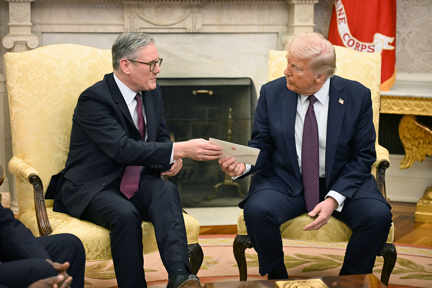 Keir Starmer hands Donald Trump a letter from King Charles at the Oval Office in February, inviting the US president to a second UK state visit