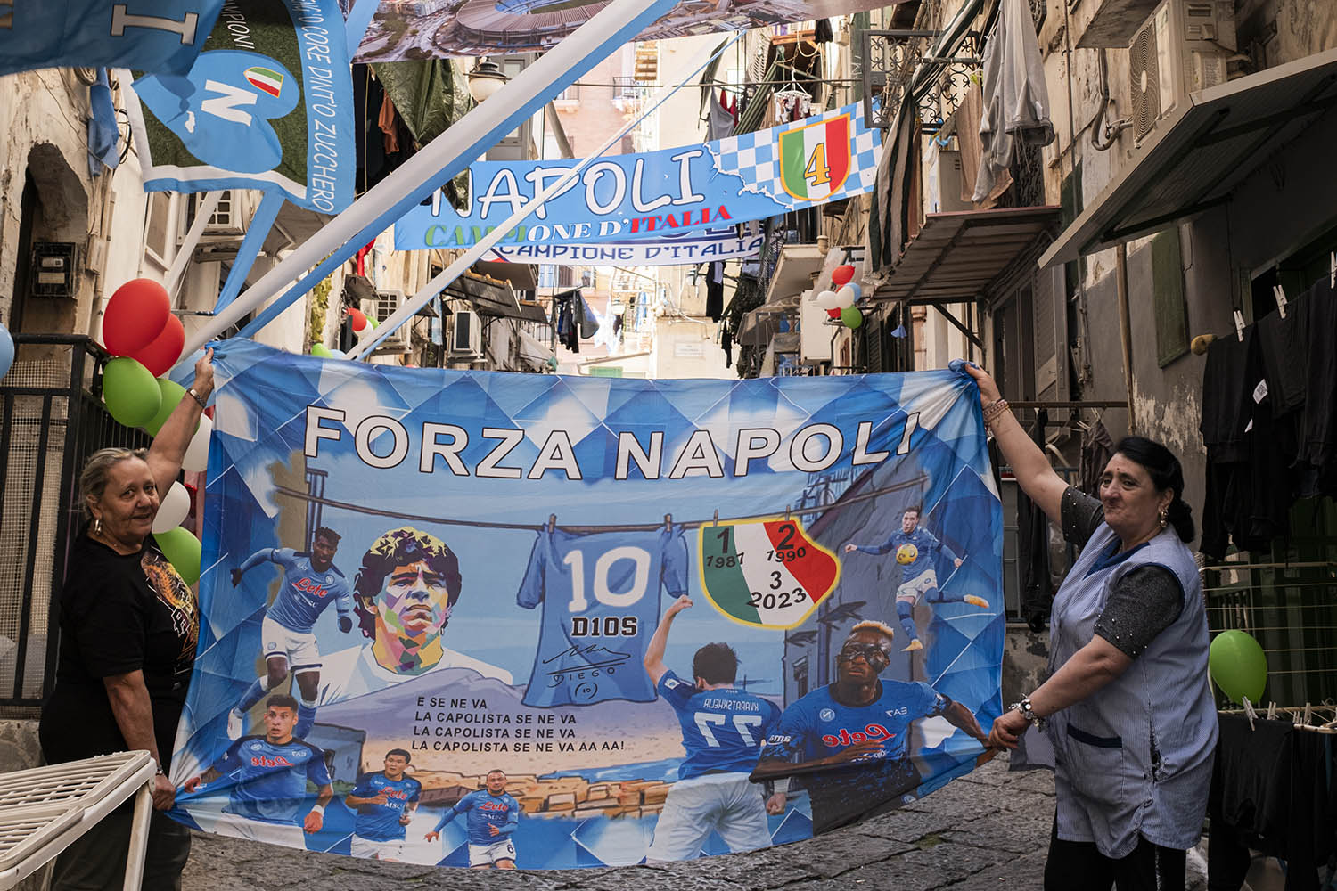 Fans prepare the the streets of the historic Quartieri Spagnoli ahead of kick-off