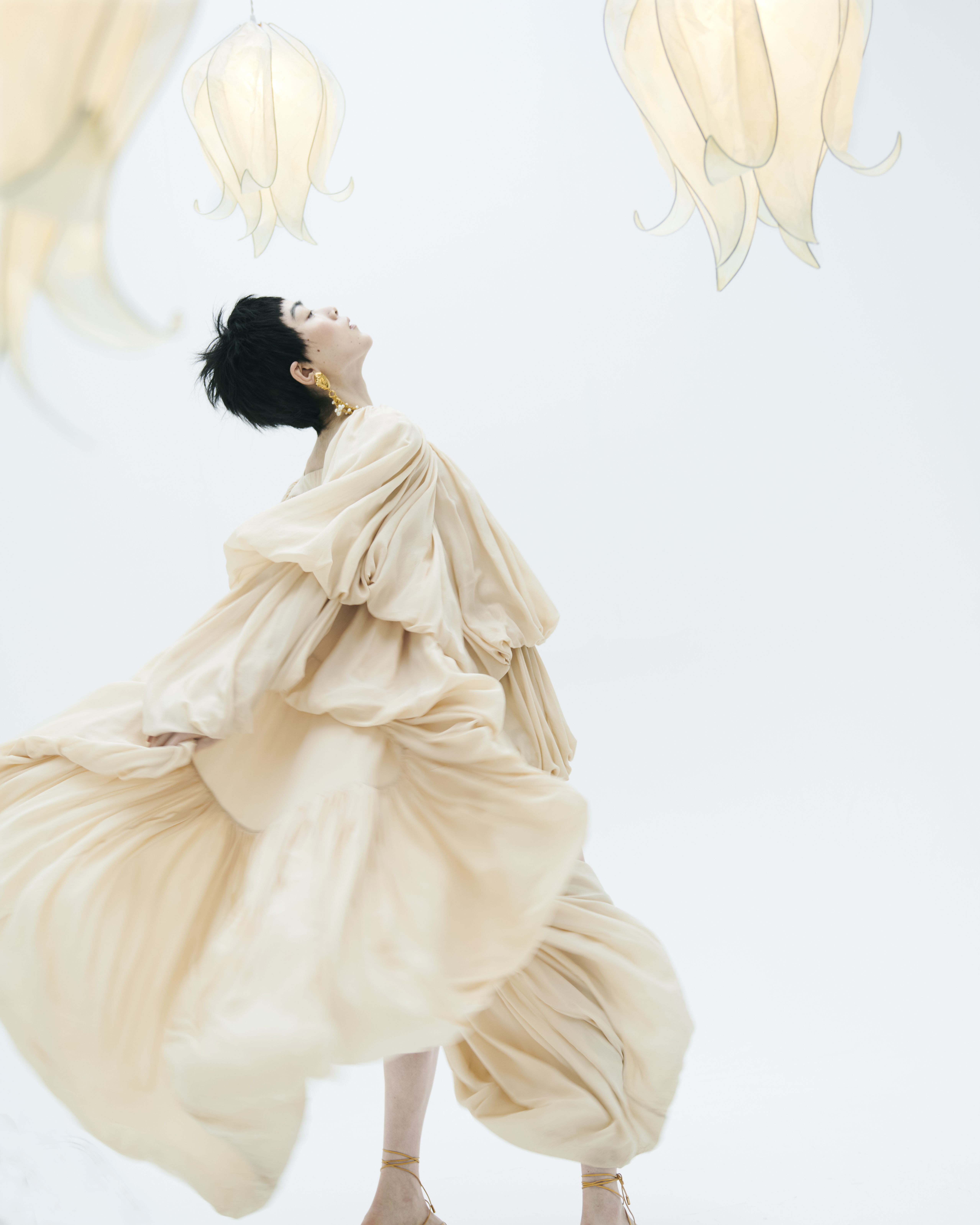 Dress, shoes and earrings Chloe Pendant lampshades Colin Chetwood