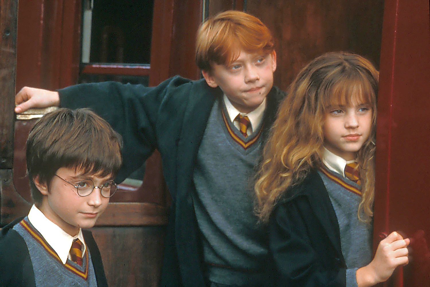 The original cast: Daniel Radcliffe, Rupert Grint and Emma Watson. Alamy
