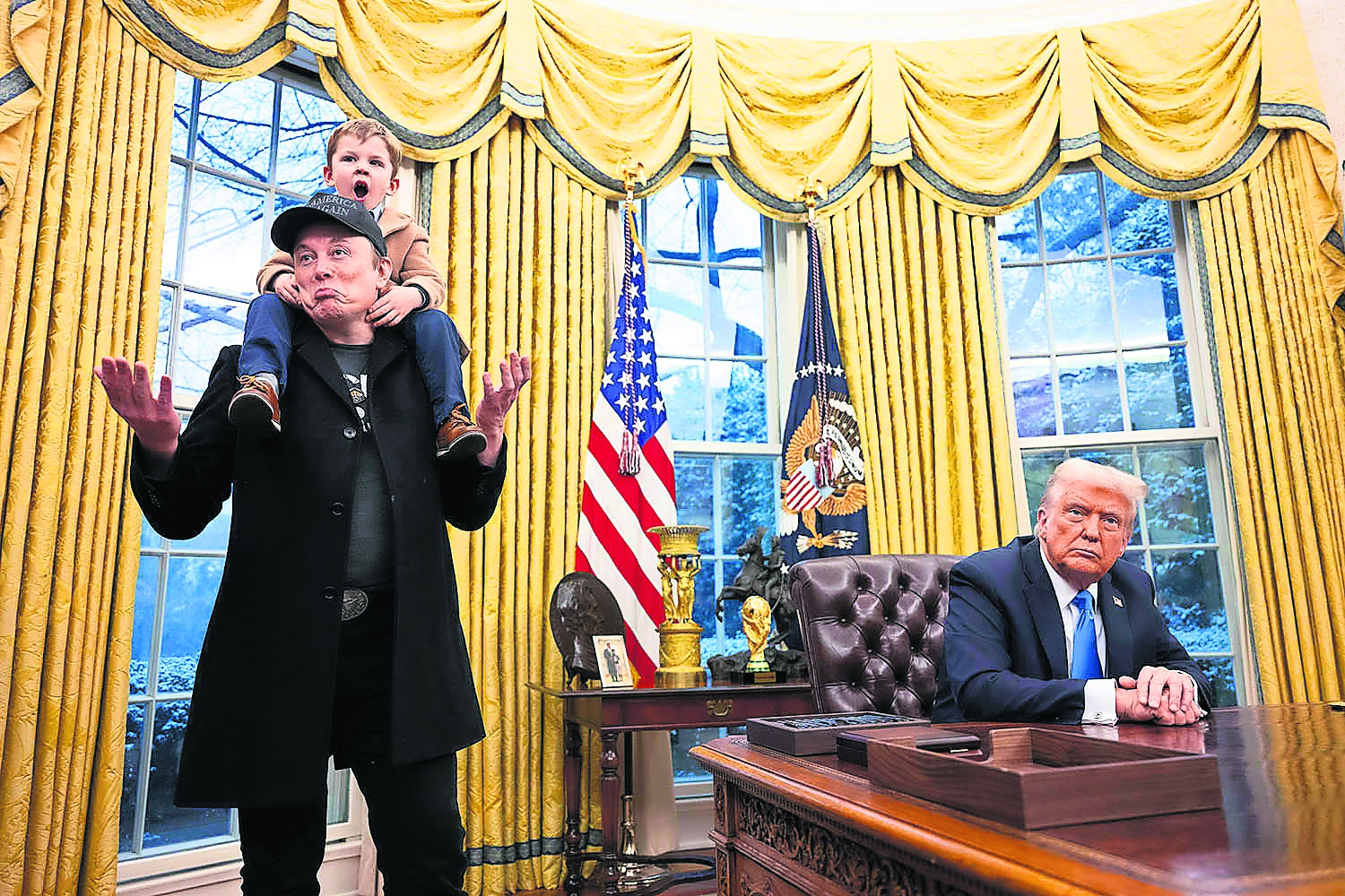 Musk with his son, X Æ A-12, and President Trump in the Oval Office