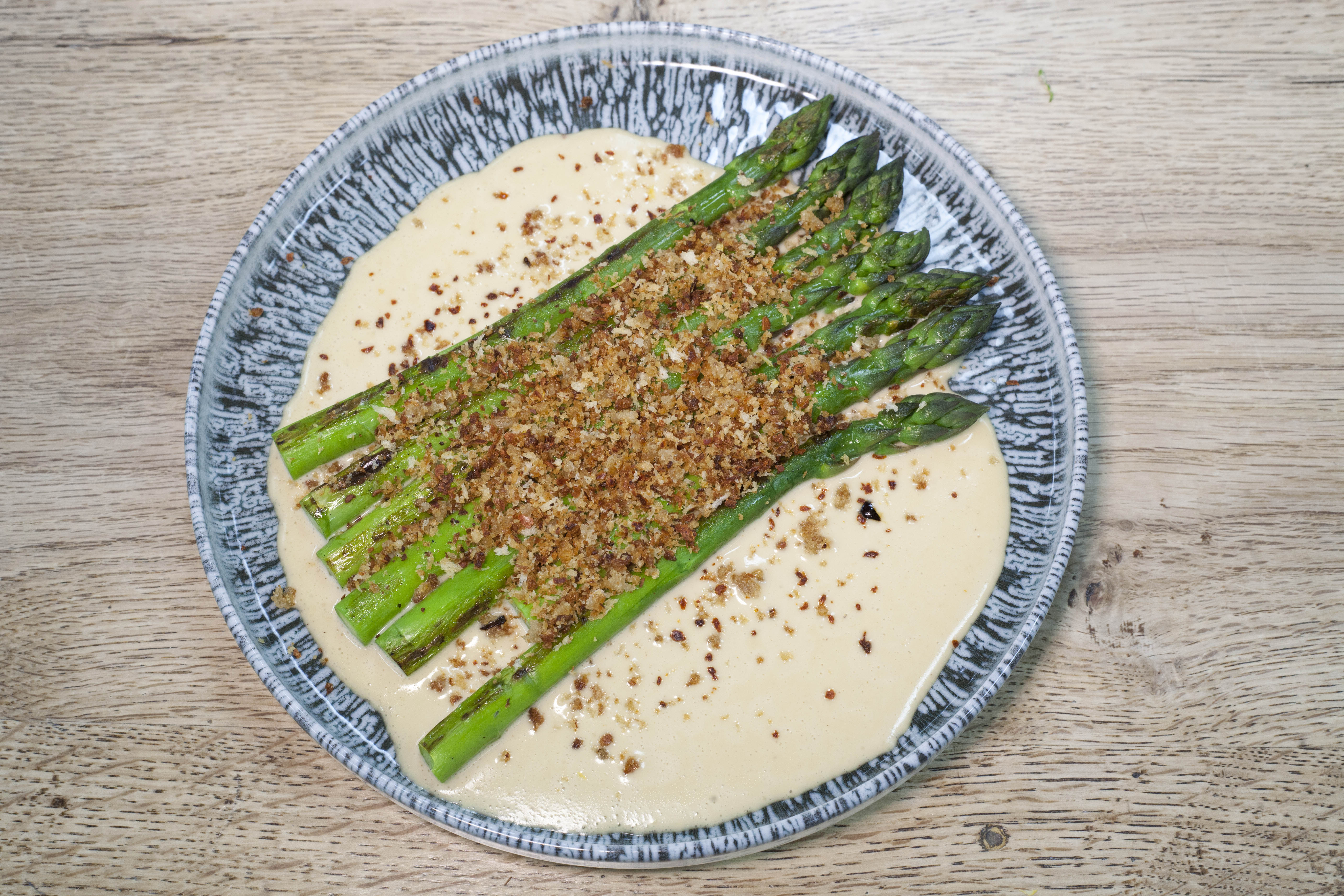 ‘A miraculous balance of salt, citrus and crunch’: Wykham farm asparagus, pitchfork cheddar, citrus pangrattato