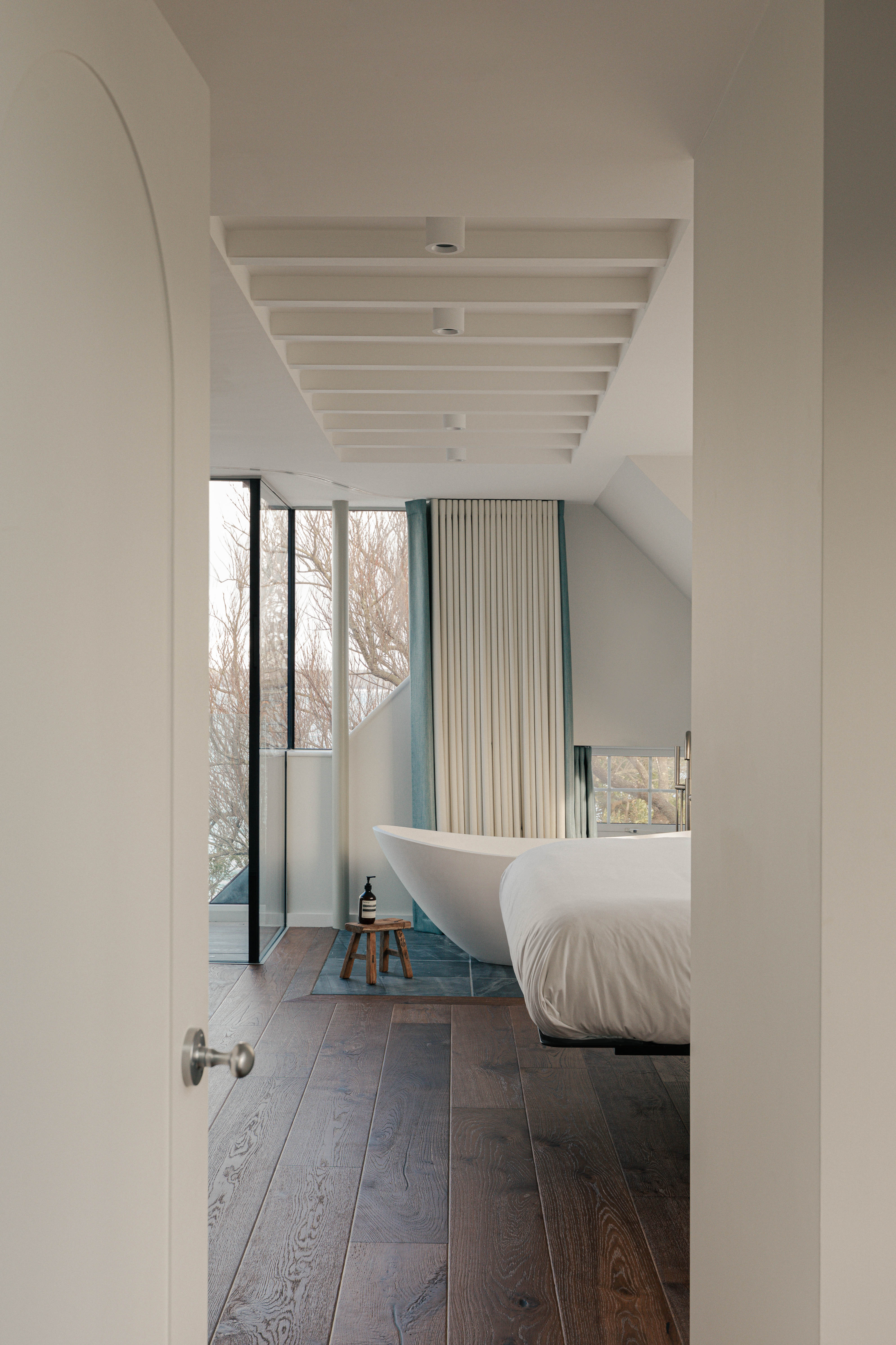 A freestanding bath in the master bedroom