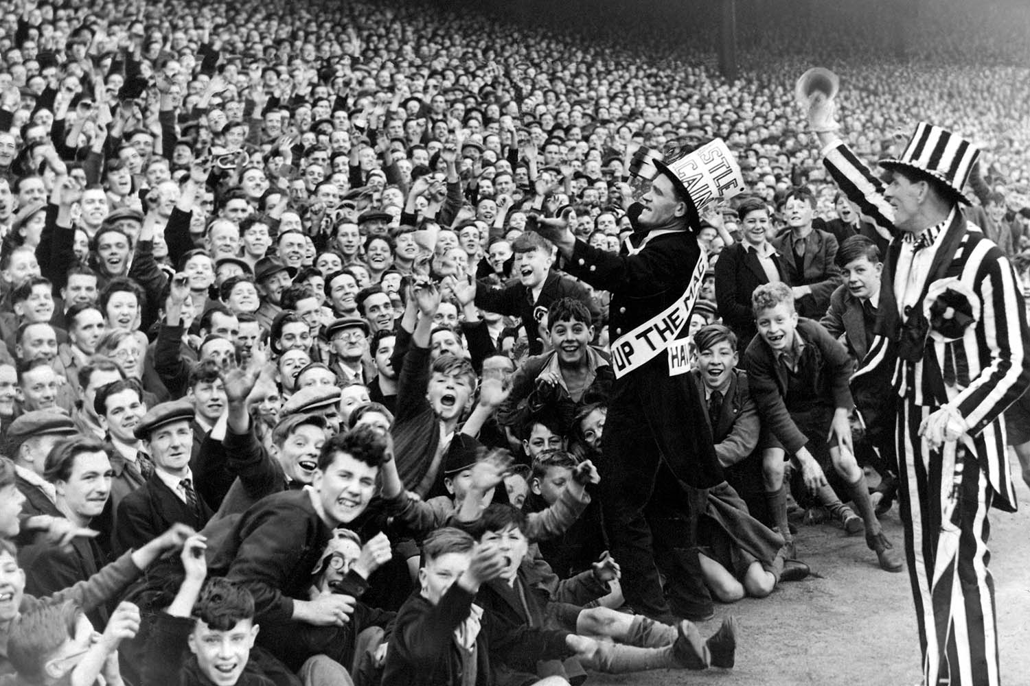 Choir master: Newcastle mascot Jimmy Nichol leads the chorus in this 1949 game against Sheffield Wednesday