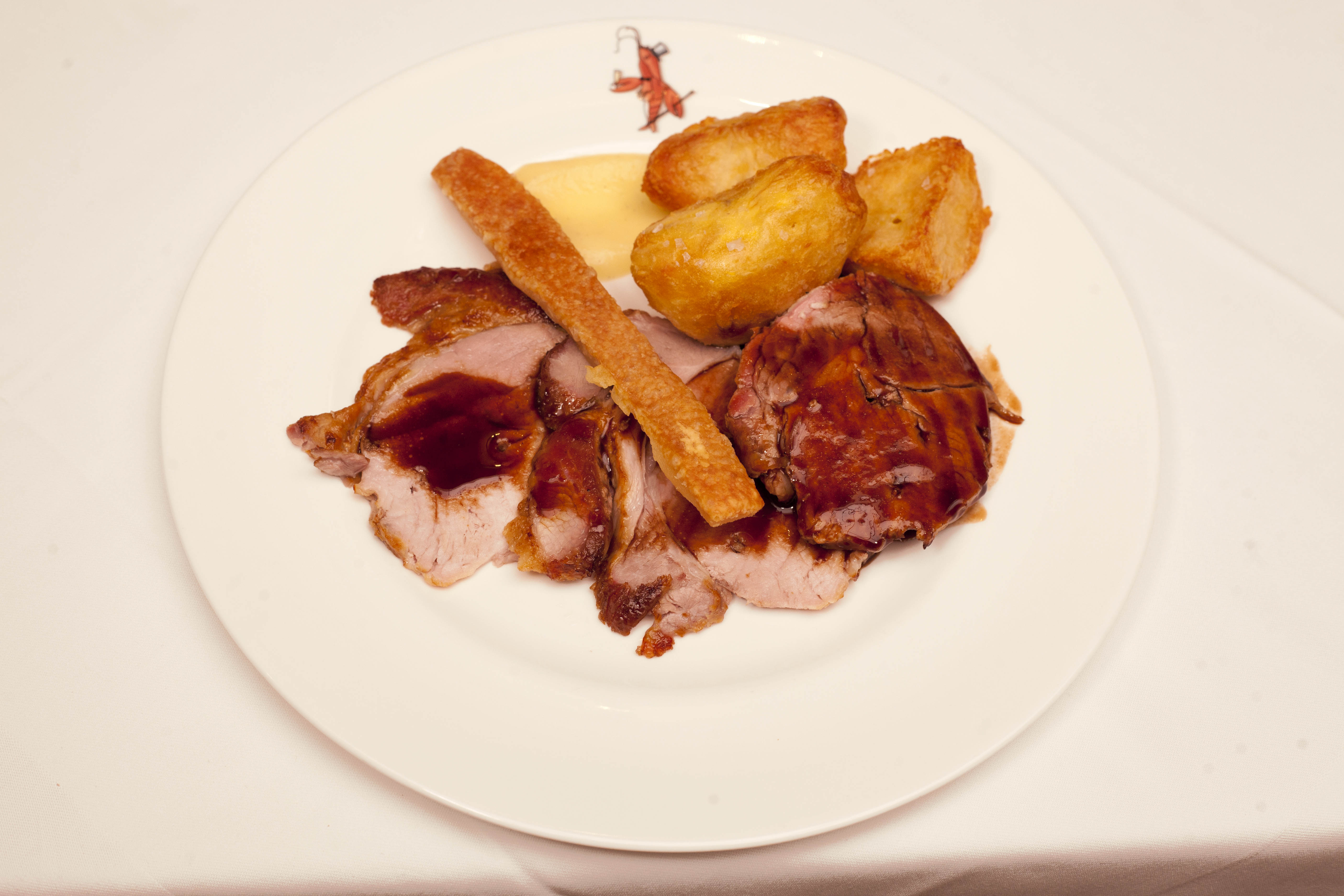 ‘Who could resist?’ Roast Blythburgh pork with roast potatoes, apple compote and crackling from the trolley