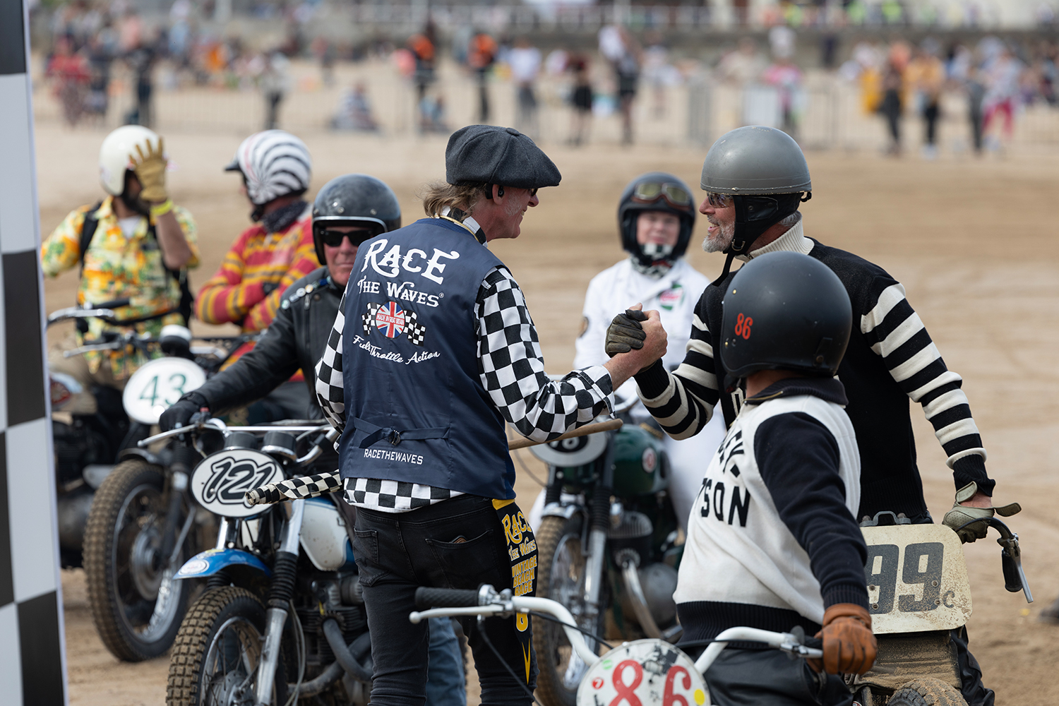 Race the Waves founder Paul Garbutt chats to Harley Davidson riders from the Netherlands.