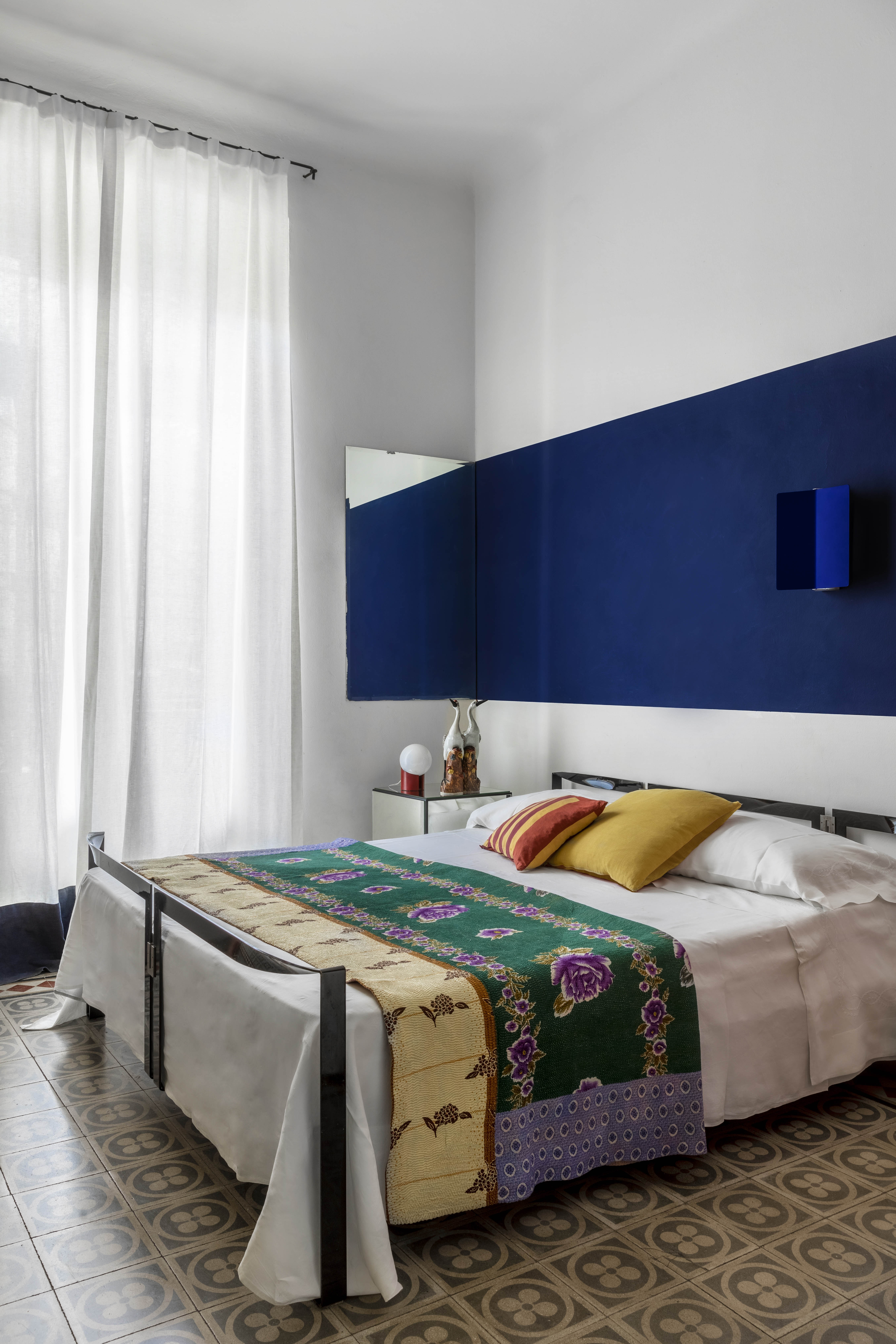 Planes of blue and white in the main bedroom