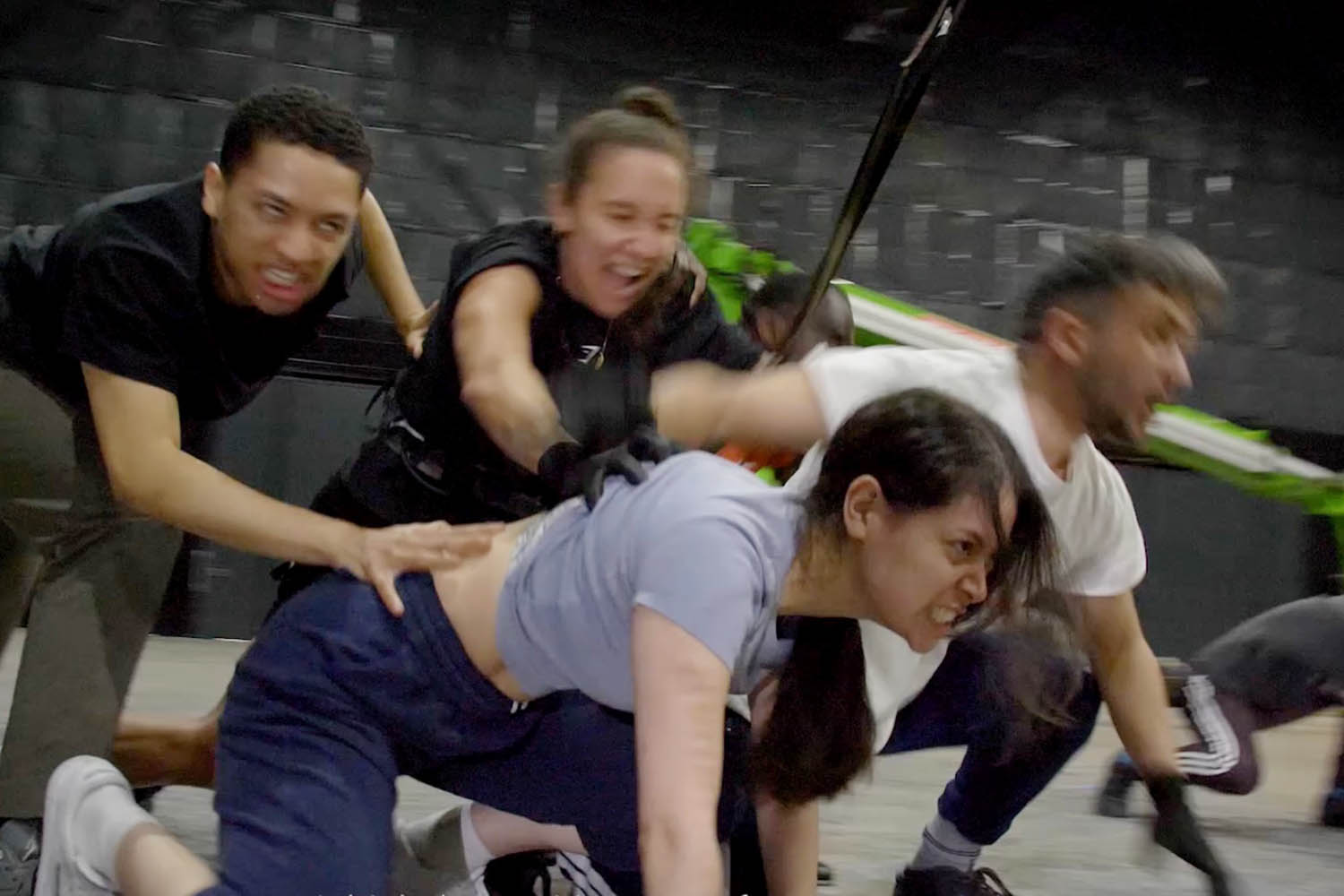 Members of the cast of The Hunger Games training for acrobatic and fighting scenes