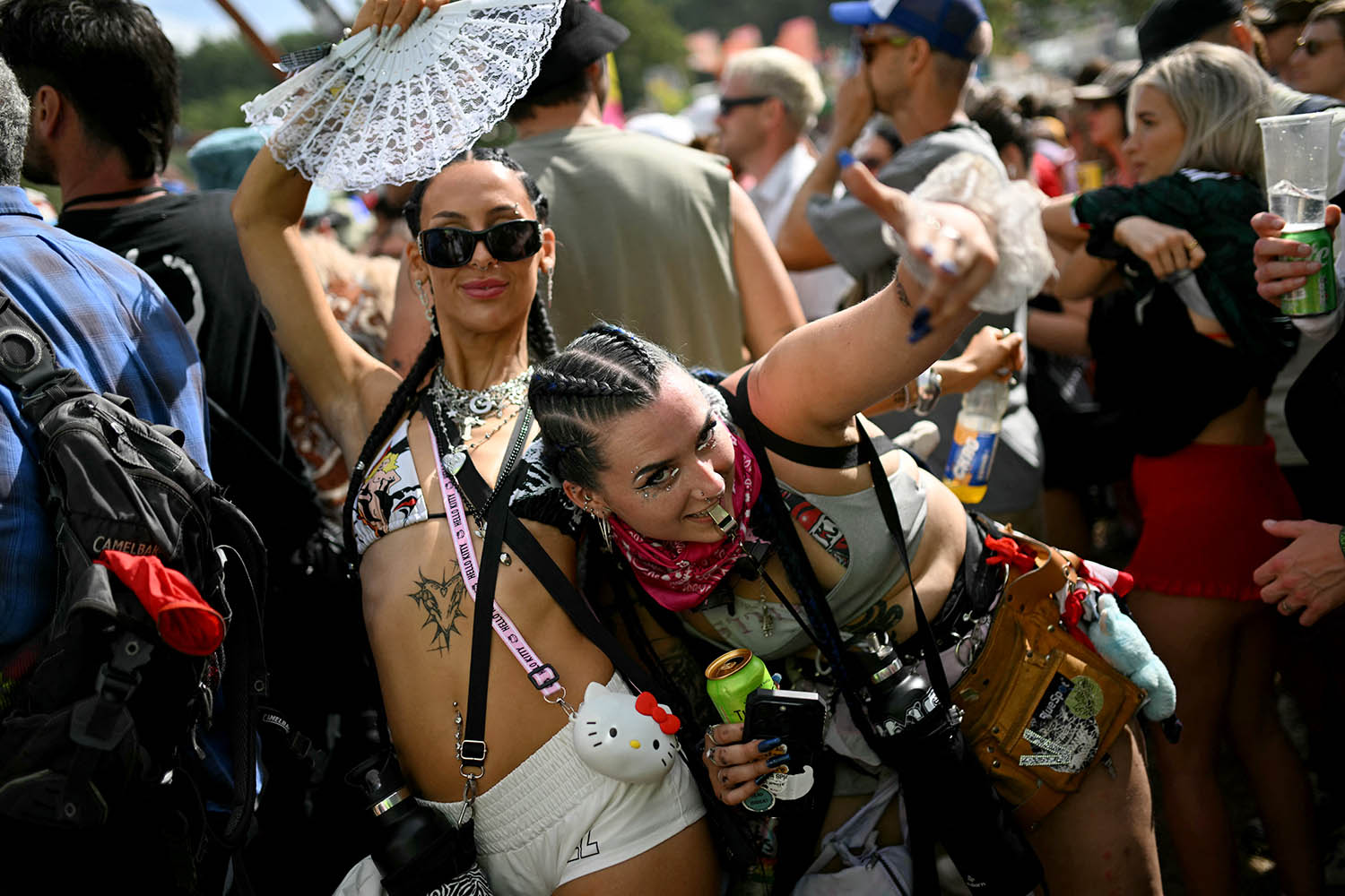 Festival goers dance in the shangri-la area of the 2025 Glastonbury Festival