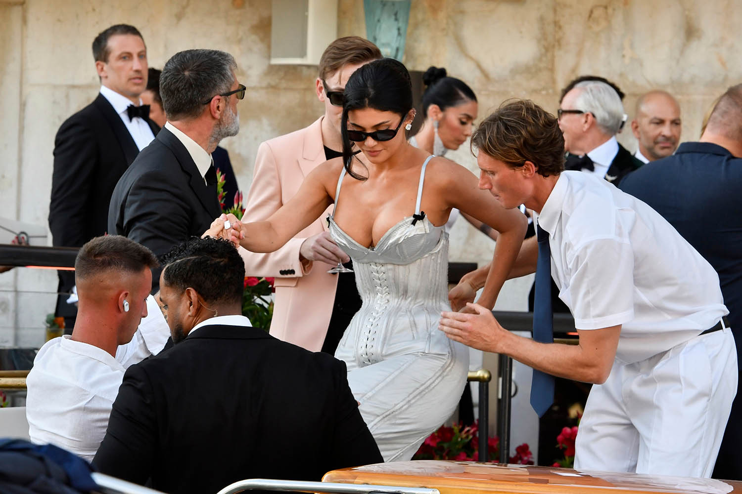 Kylie Jenner was criticised for wearing a dress dangerously similar to the bride’s.