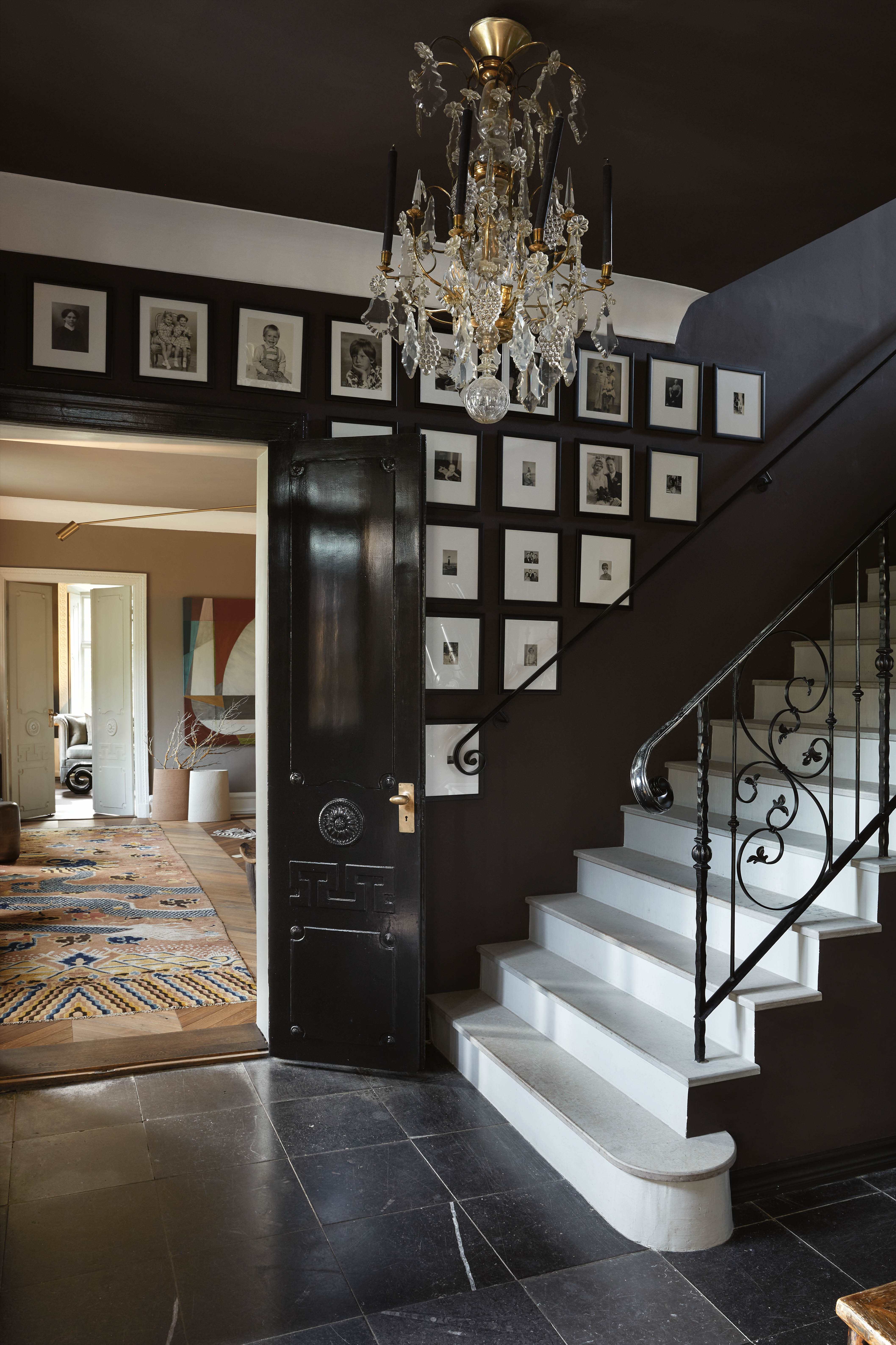 Stairway to heaven: family photographs in the dramatic entrance hall