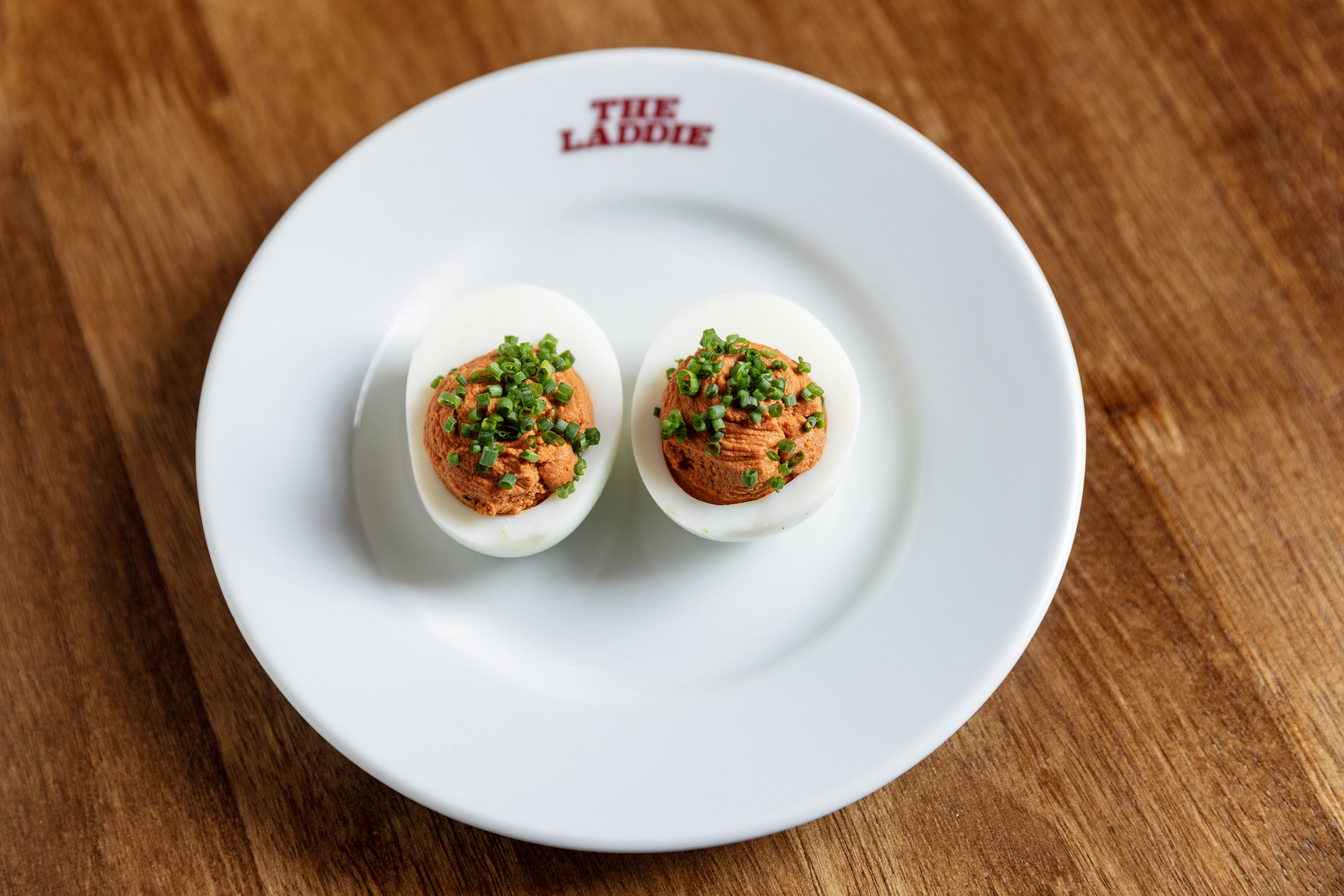 ‘Rust orange whippy quiffs’: vindaloo devilled eggs.