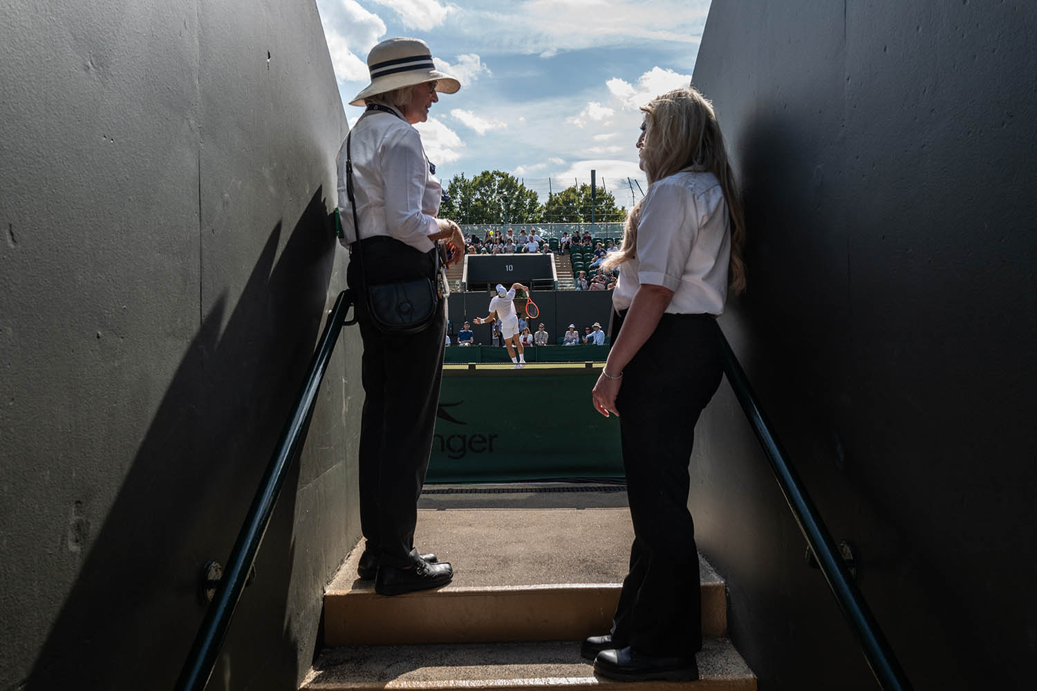Stewards overlooking the play at court no. 3