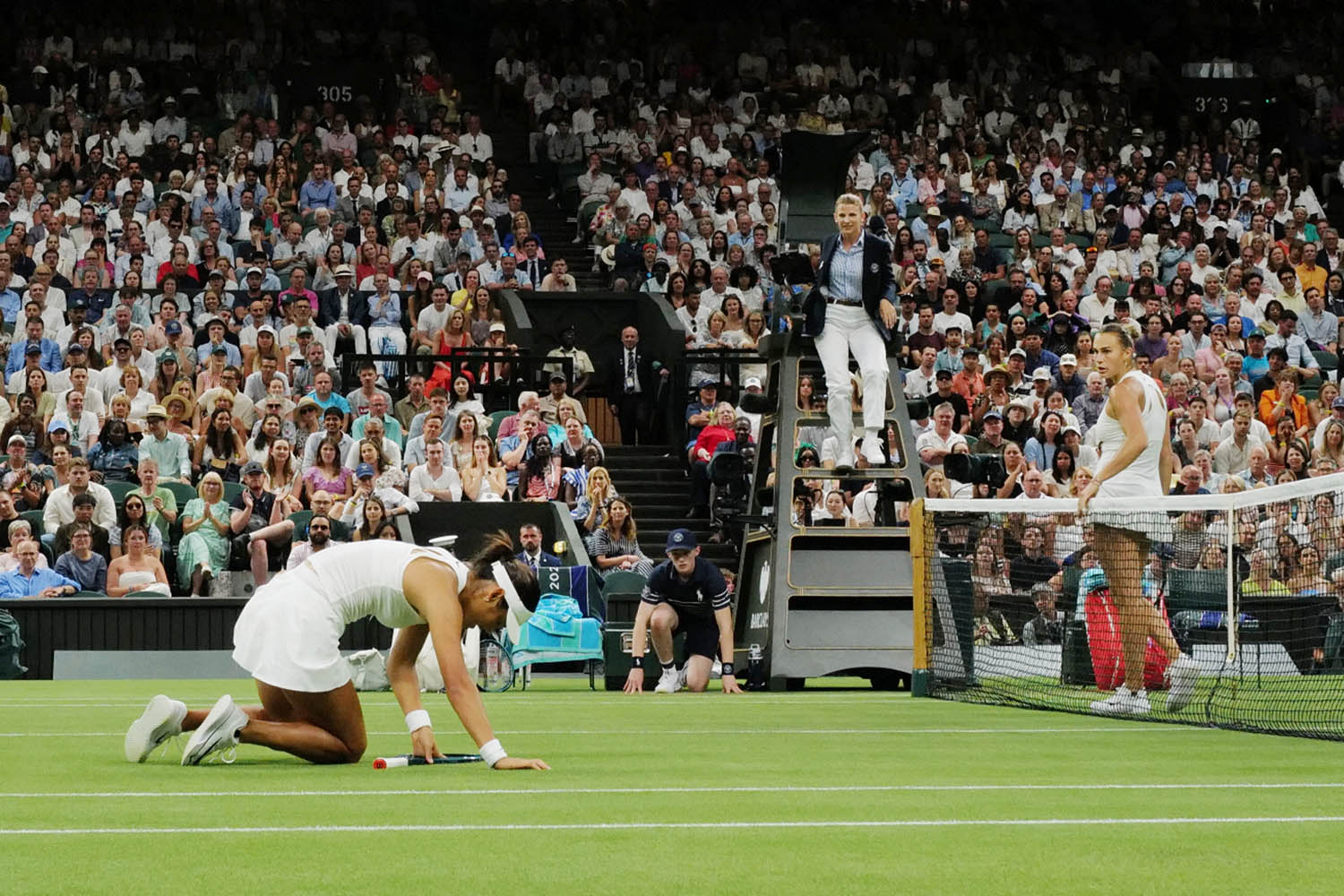 Aryna Sabalenka defeats Emma Raducanu in straight sets on centre court.