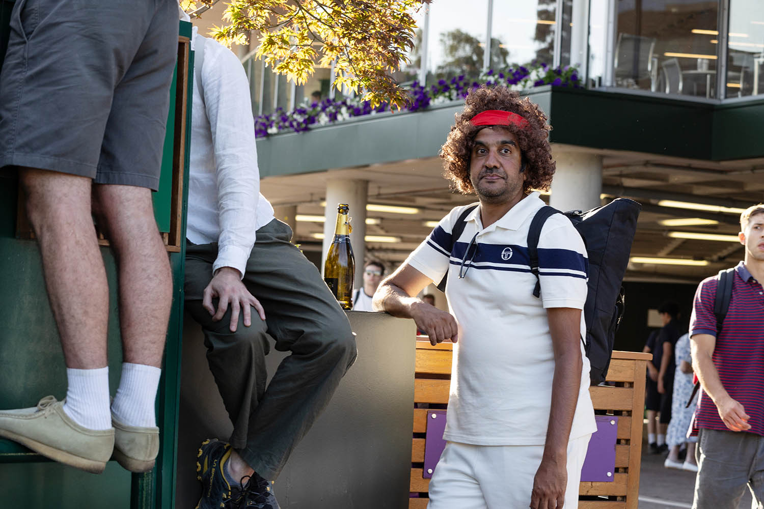 A spectator dressed as John McEnroe