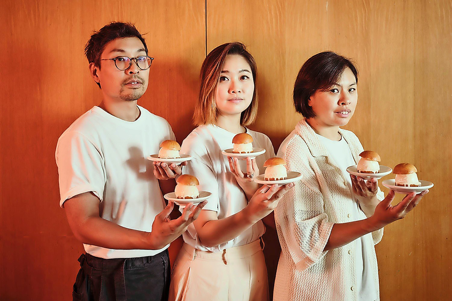 From left, Shing Tat Chung, Erchen Chang and Wai Ting Chung photographed by Phil Fisk for OFM at Bao Soho
