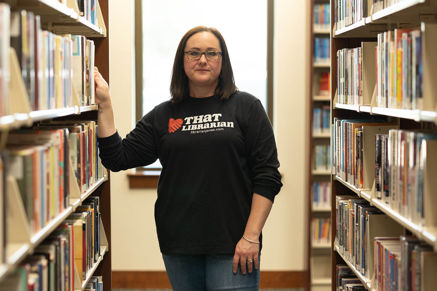 Librarian Amanda Jones, who sleeps with a shotgun under her bed