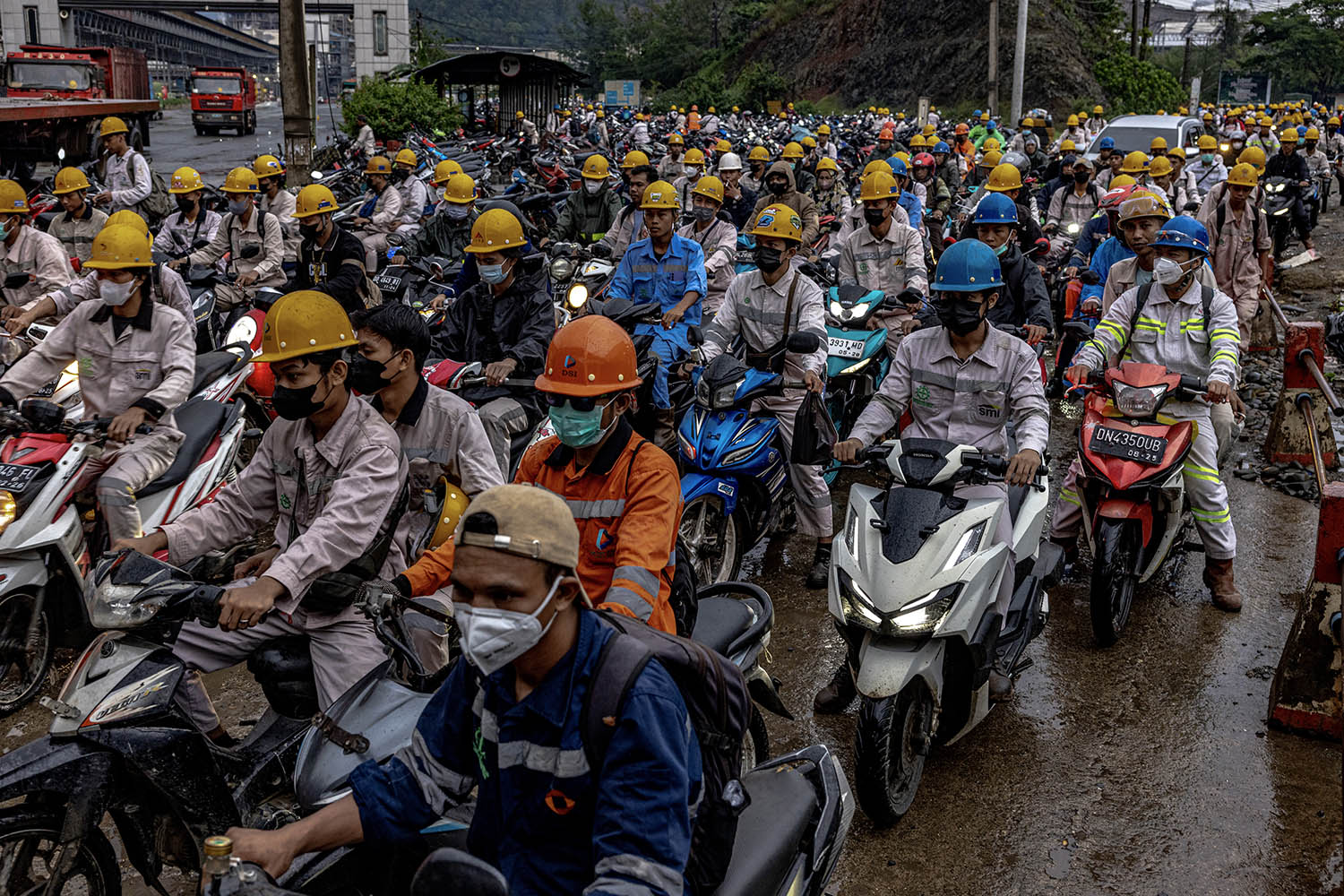 Some of the 86,000 workers employed at the mine arrive for a shift at the industrial park on Sulawesi